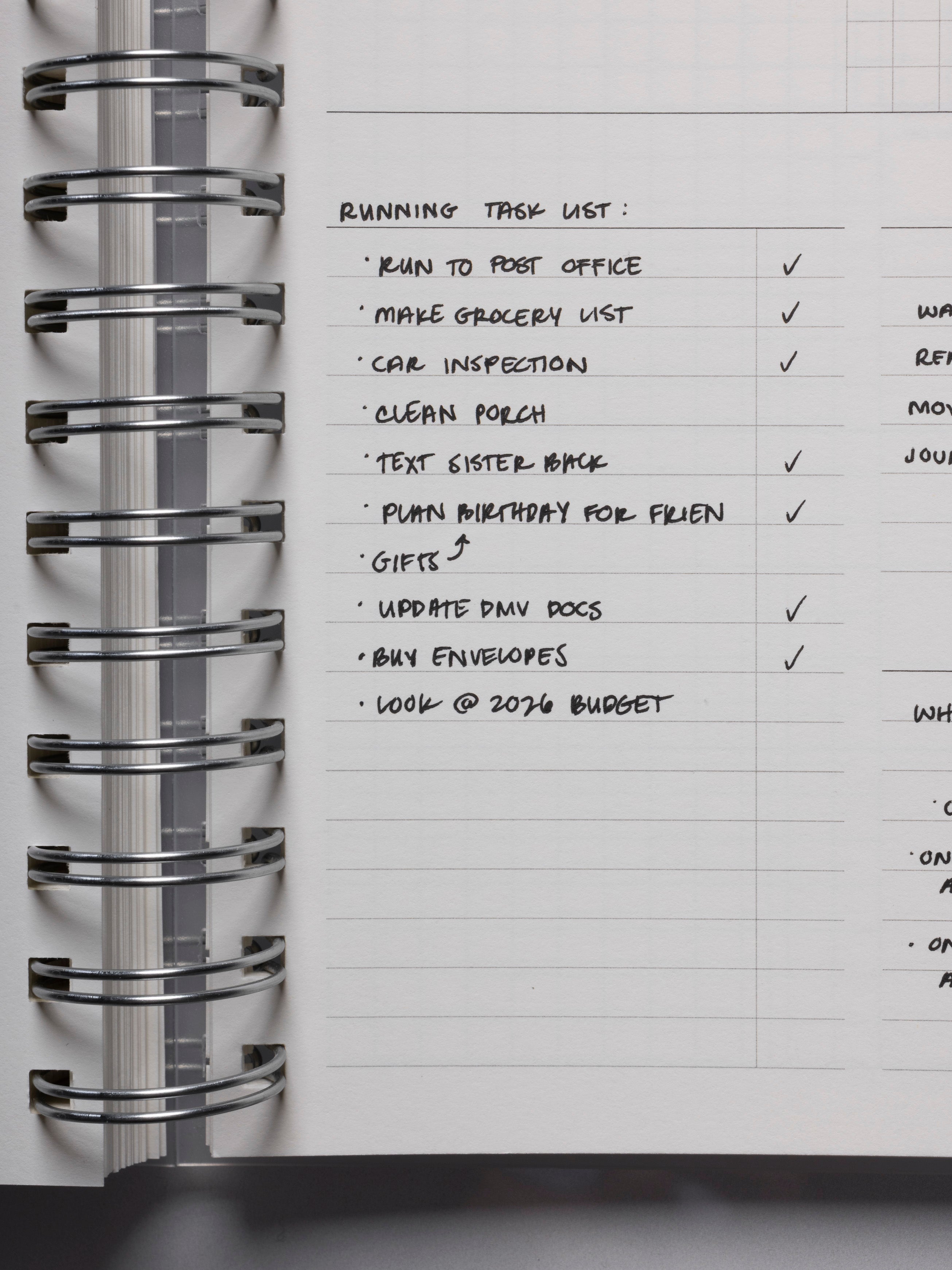 Close up of the inside of the 2026 Weekly Horizontal Notebook | Monday Start | A5 Spiral showing handwritten examples for the weekly layout task section.