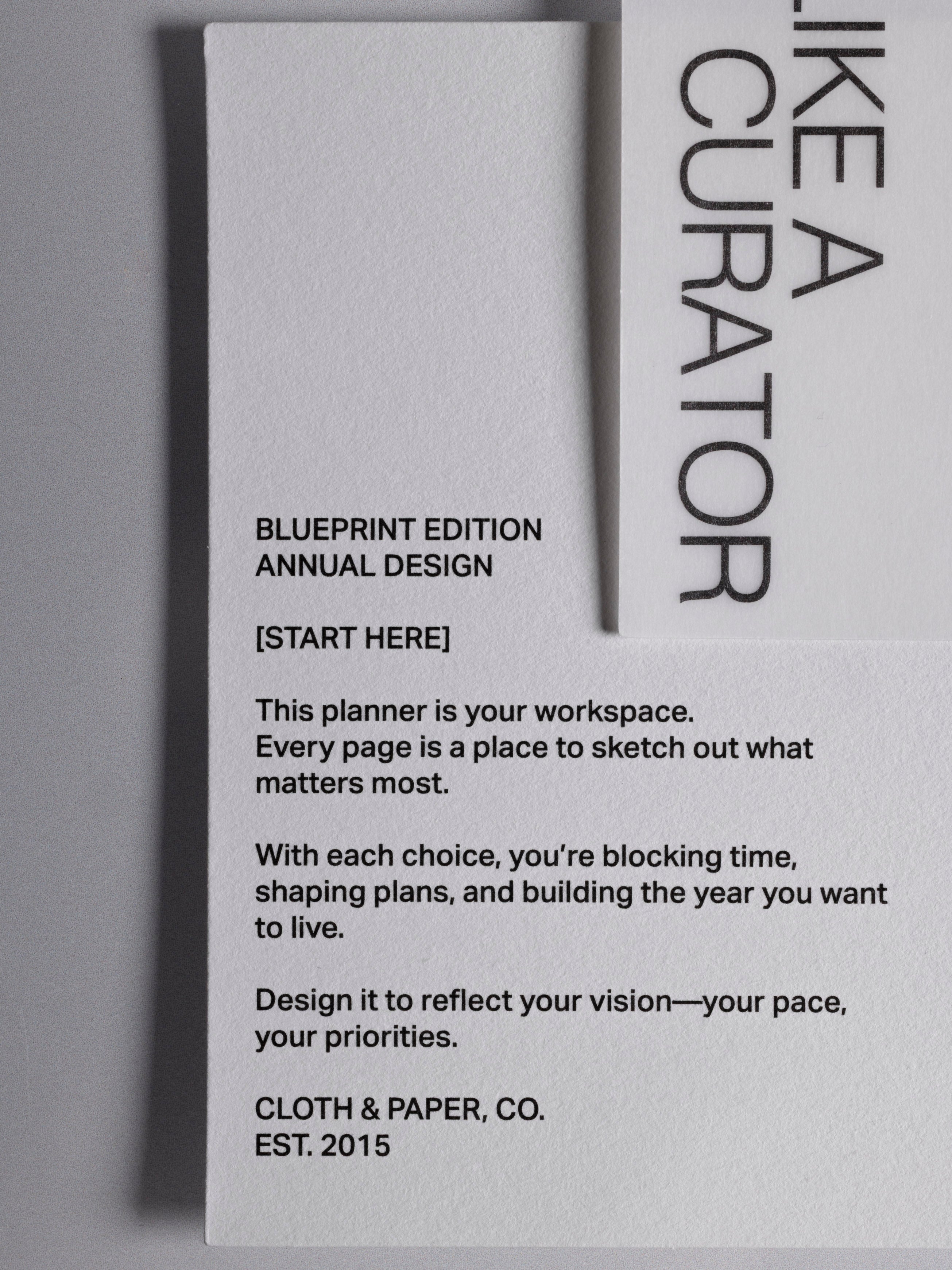 White paper journaling card with black text themed on a blueprint planning theme.