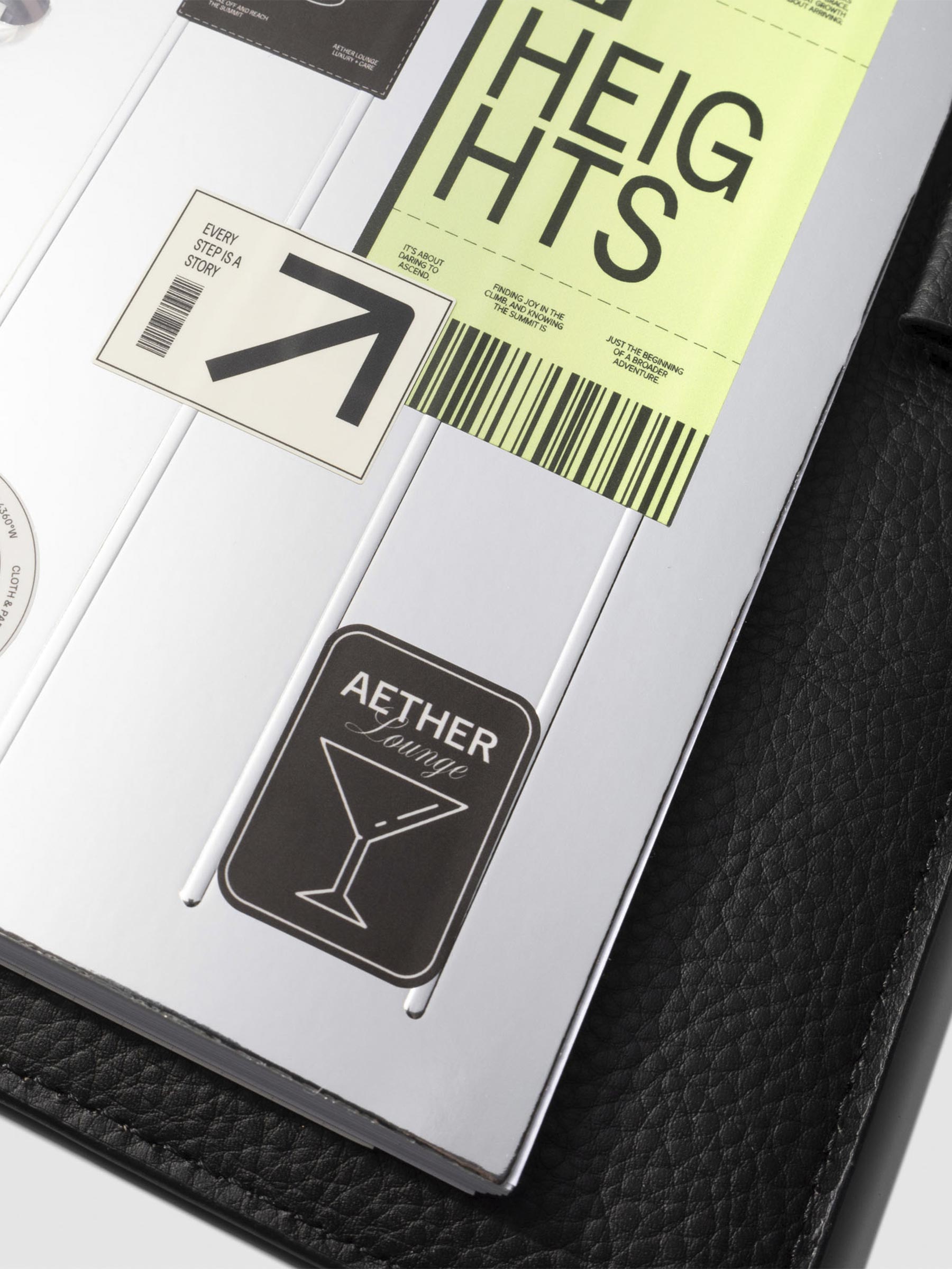 Closeup of dashboard in a black leather planner displayed on a neutral background. Size shown is CP Petite.