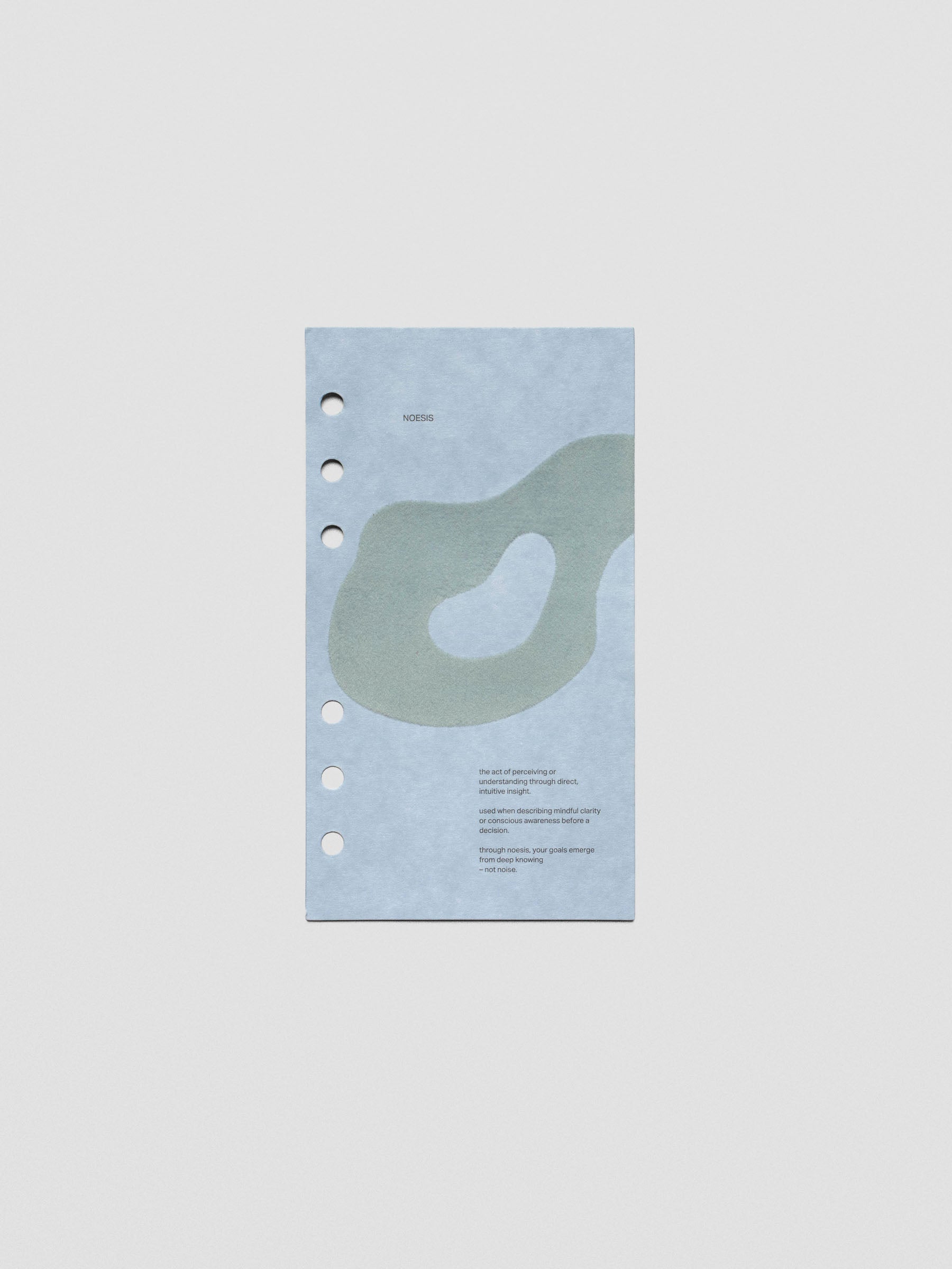Blue speckle cardstock planner dashboard with organic shape design flocked in blue-green with text design shown in Personal size.