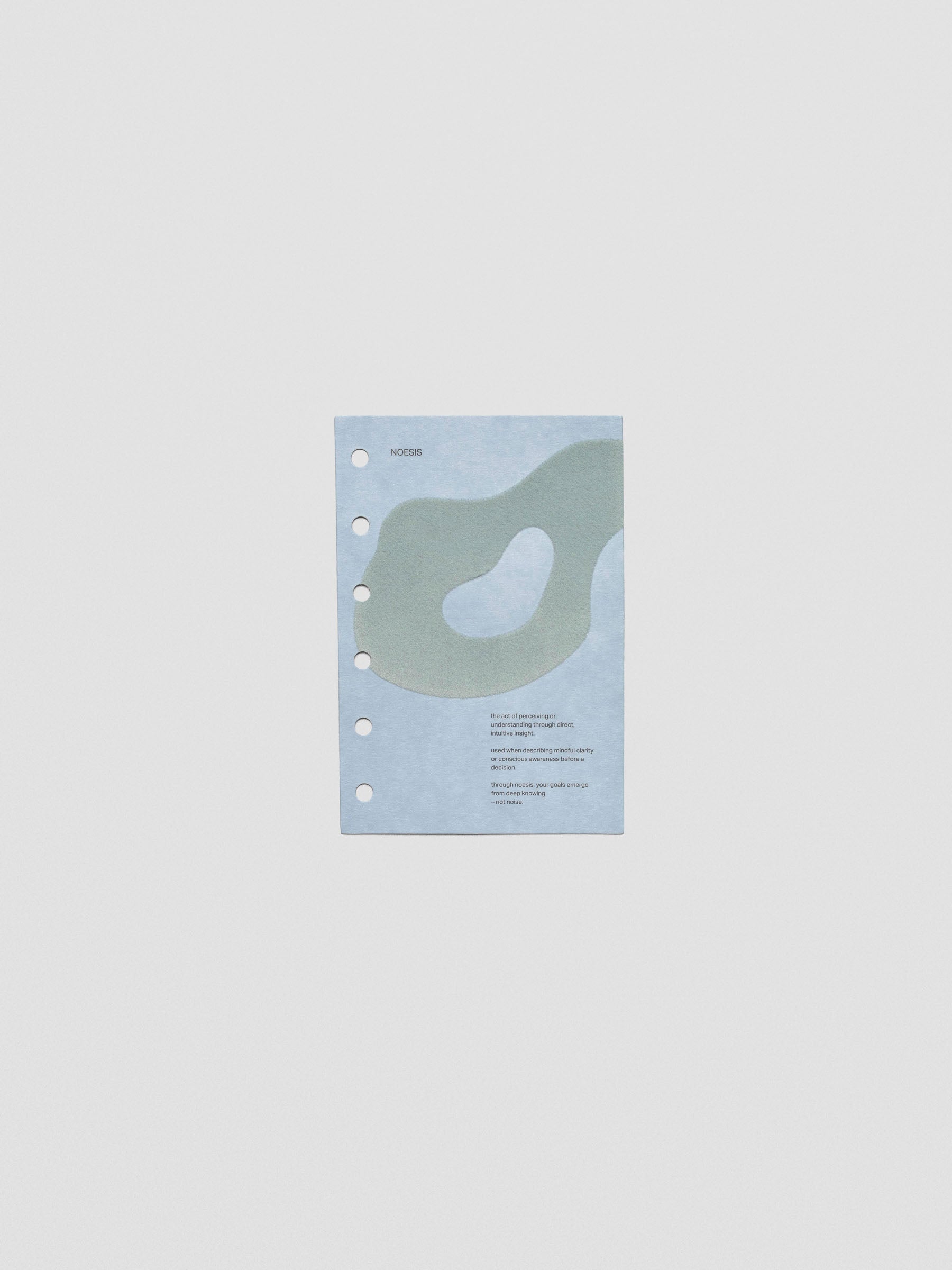 Blue speckle cardstock planner dashboard with organic shape design flocked in blue-green with text design shown in pocket size.