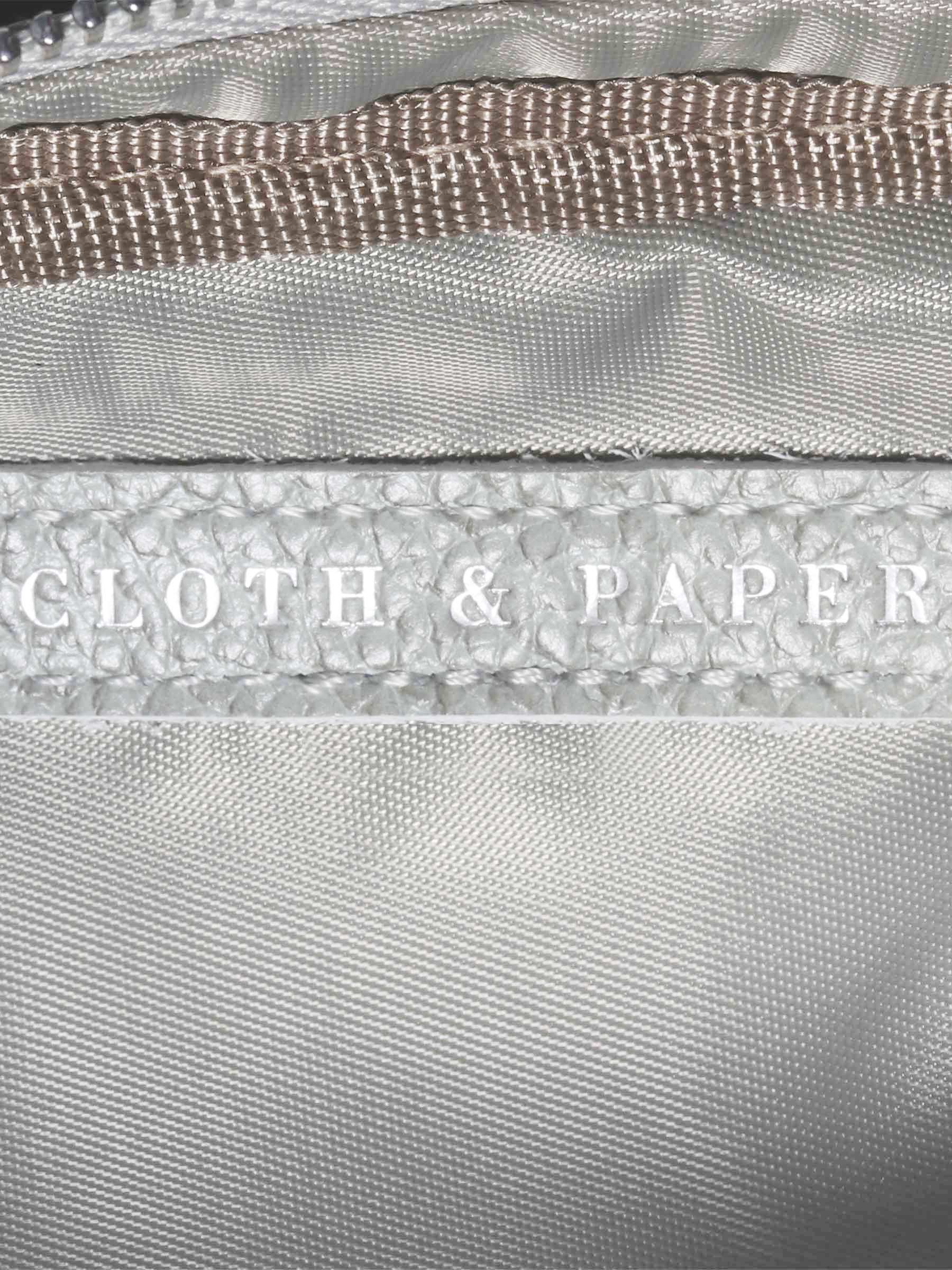 Closeup of Cloth and Paper logo inside Ristretto pouch. 