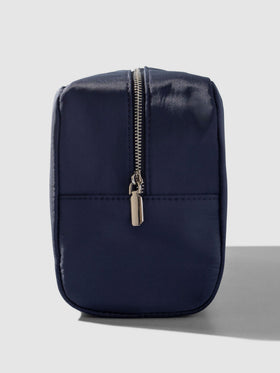 Nylon Travel Pouch, Apollo, Cloth and Paper. Pouch shown from the side on a neutral background, zipper side exposed.