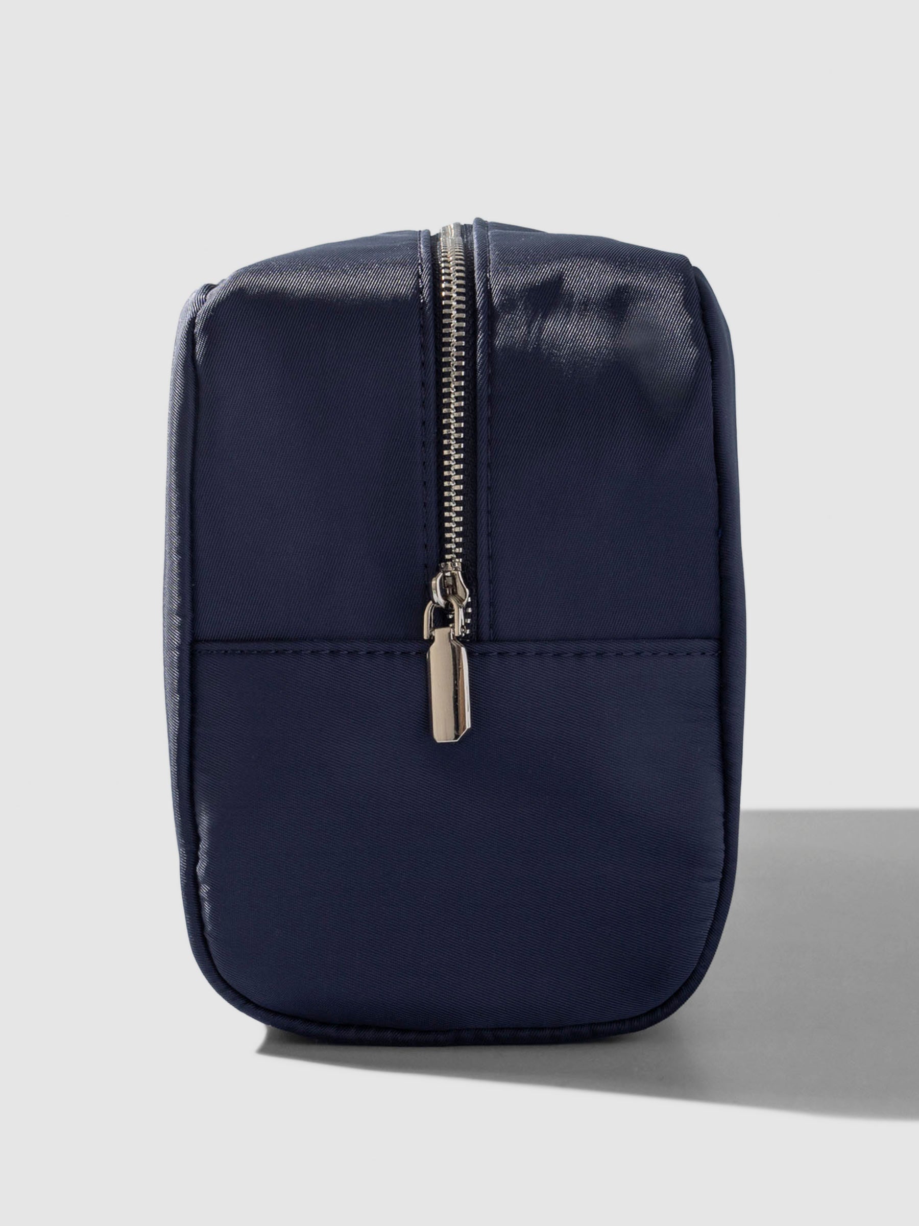 Nylon Travel Pouch, Apollo, Cloth and Paper. Pouch shown from the side on a neutral background, zipper side exposed.