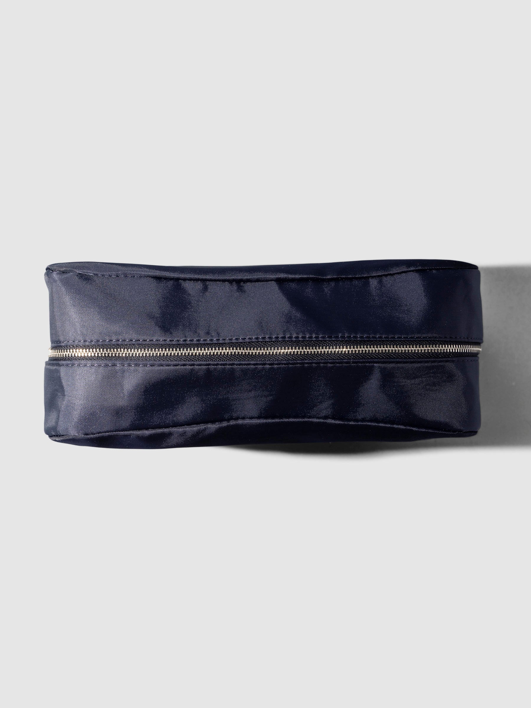 Apollo blue pouch shown from a top down angle on a neutral background.