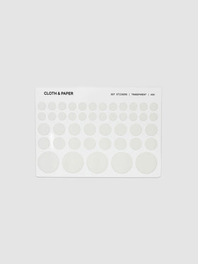 One sheet of transparent dot stickers with letters design in small, medium, and large sizes shown against a neutral background.