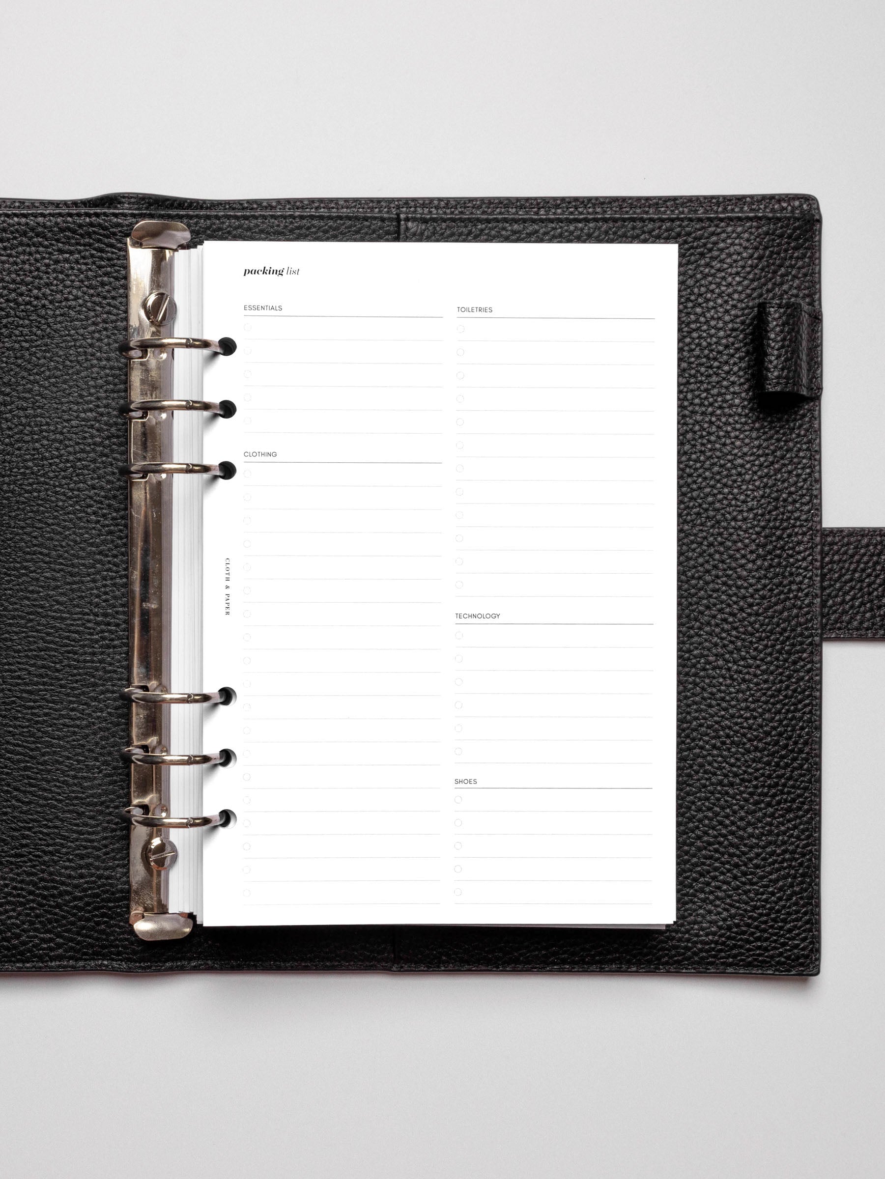 Insert in use inside a black leather planner.