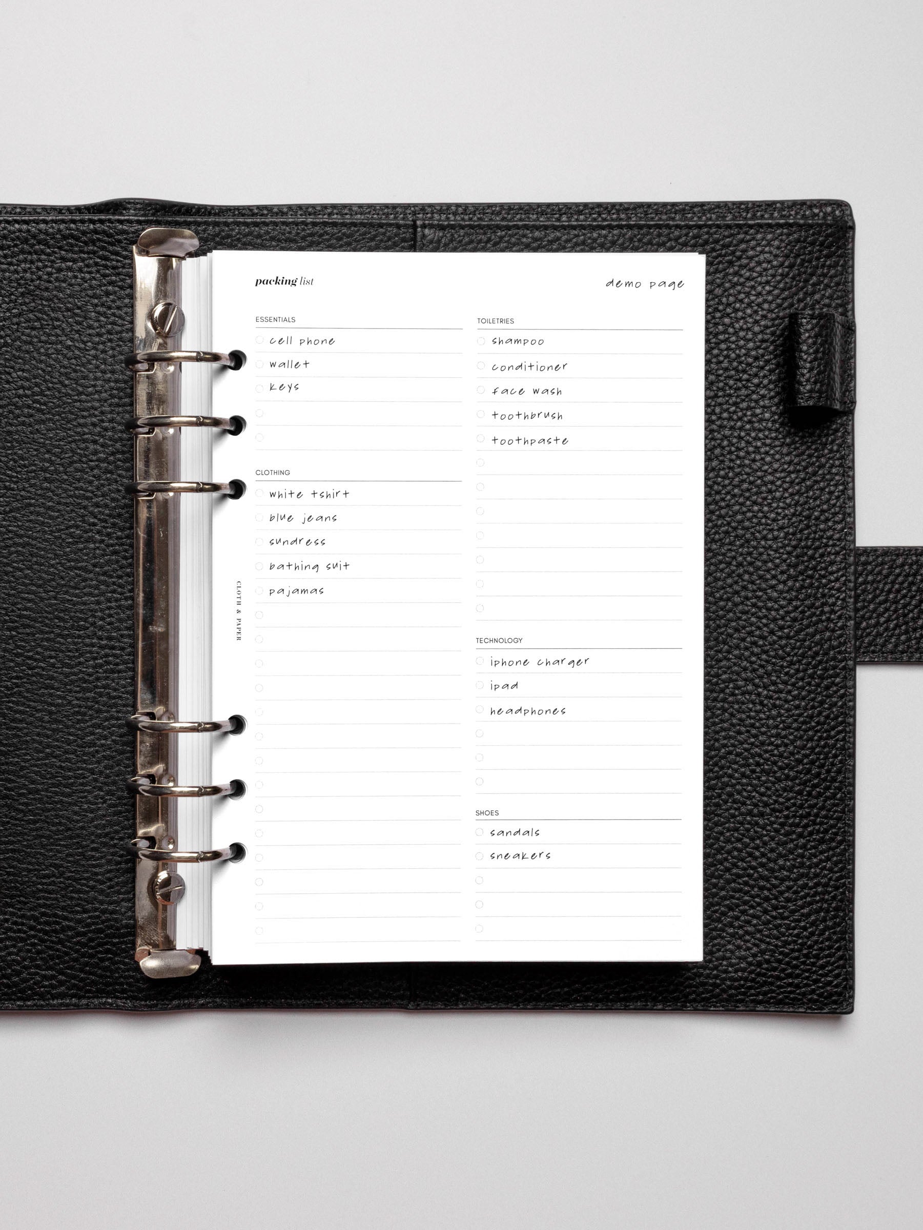 Insert in use inside a black leather planner.