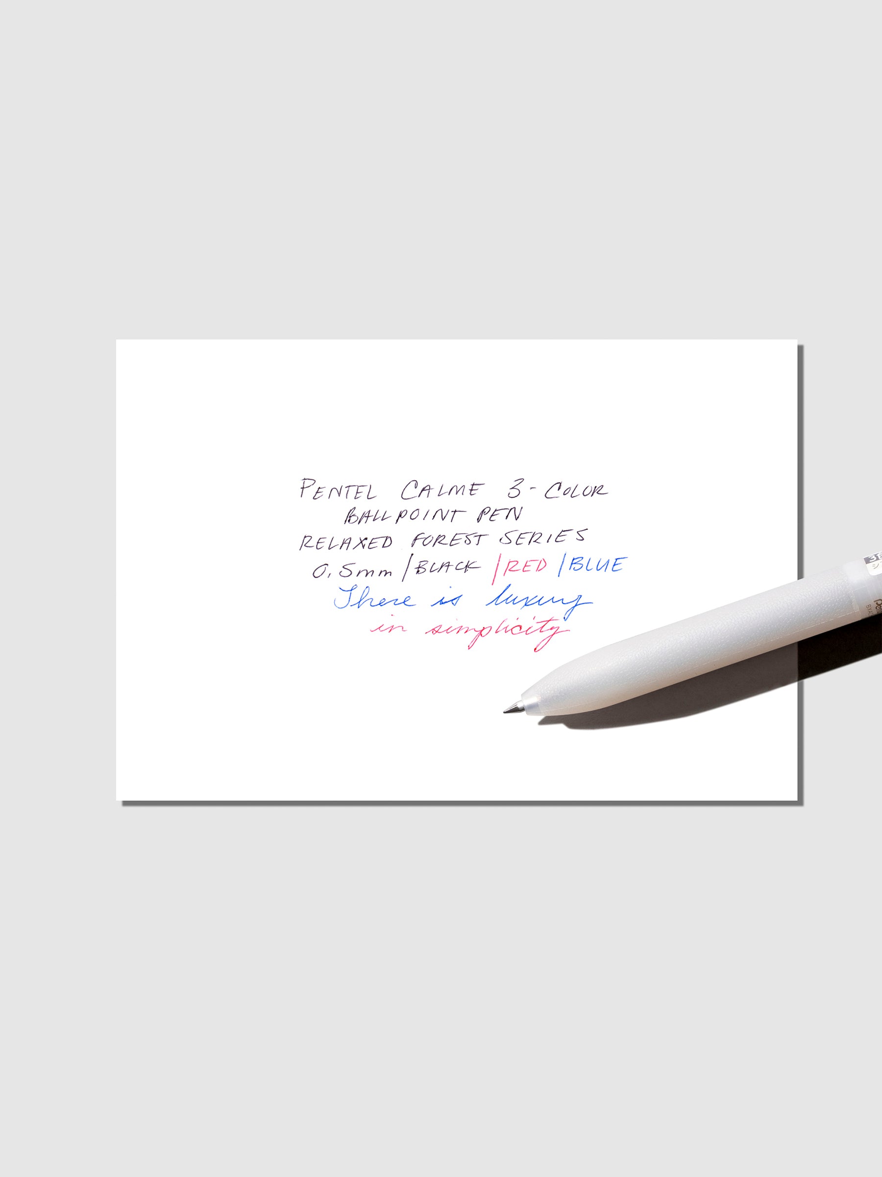 Pen test sheet shown with white pen on a neutral background.