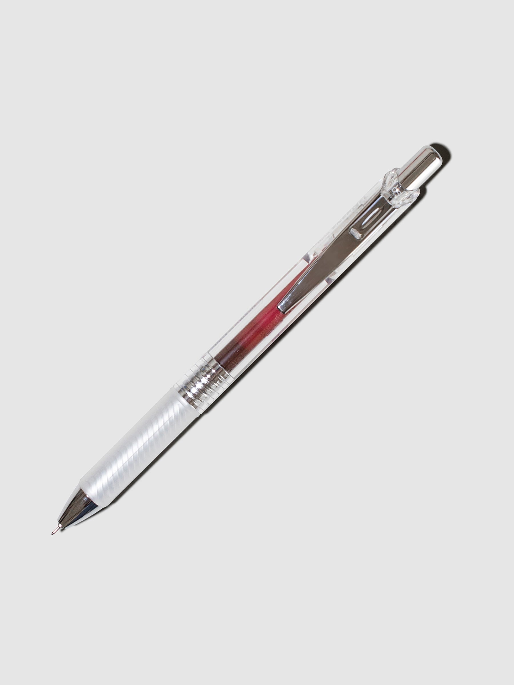 Pentel EnerGel, Burgundy, Cloth and Paper. Pen displayed on a neutral background.