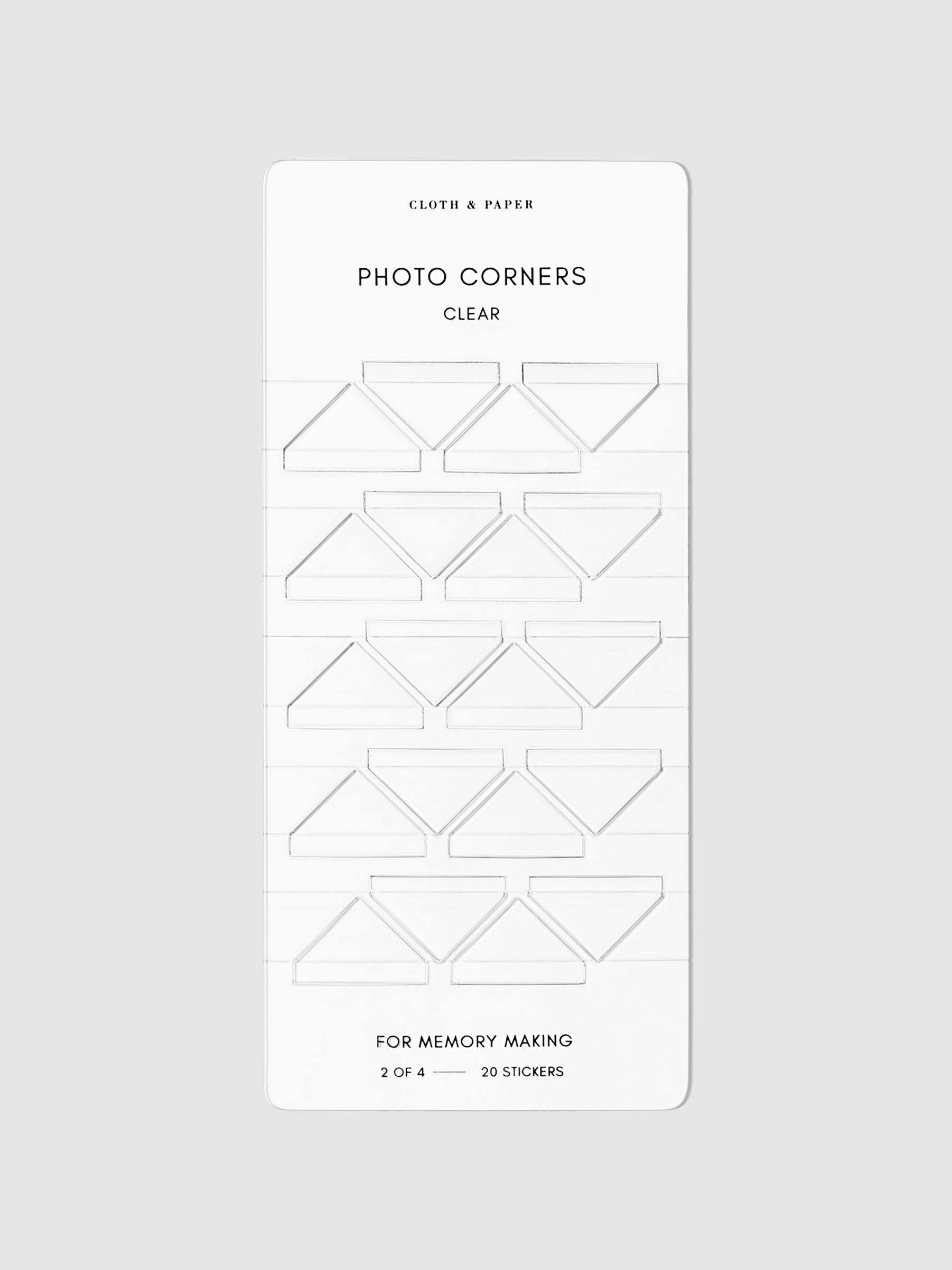 Clear photo corners displayed on a neutral background.