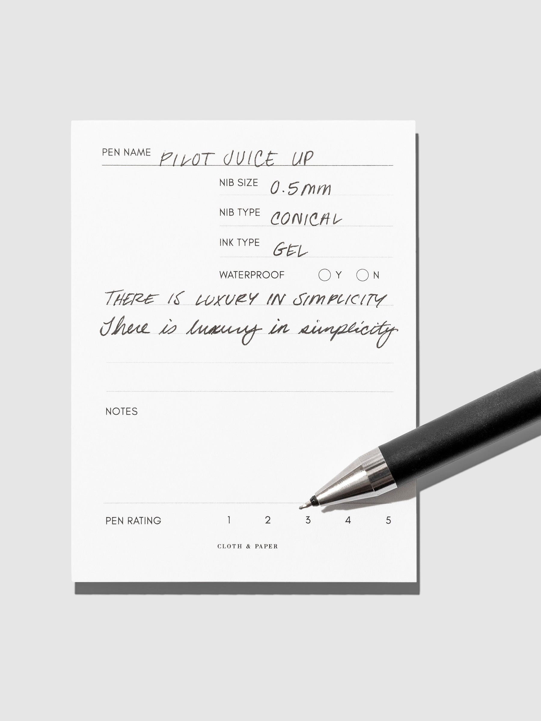 Pen displayed on an in use pen test sheet.