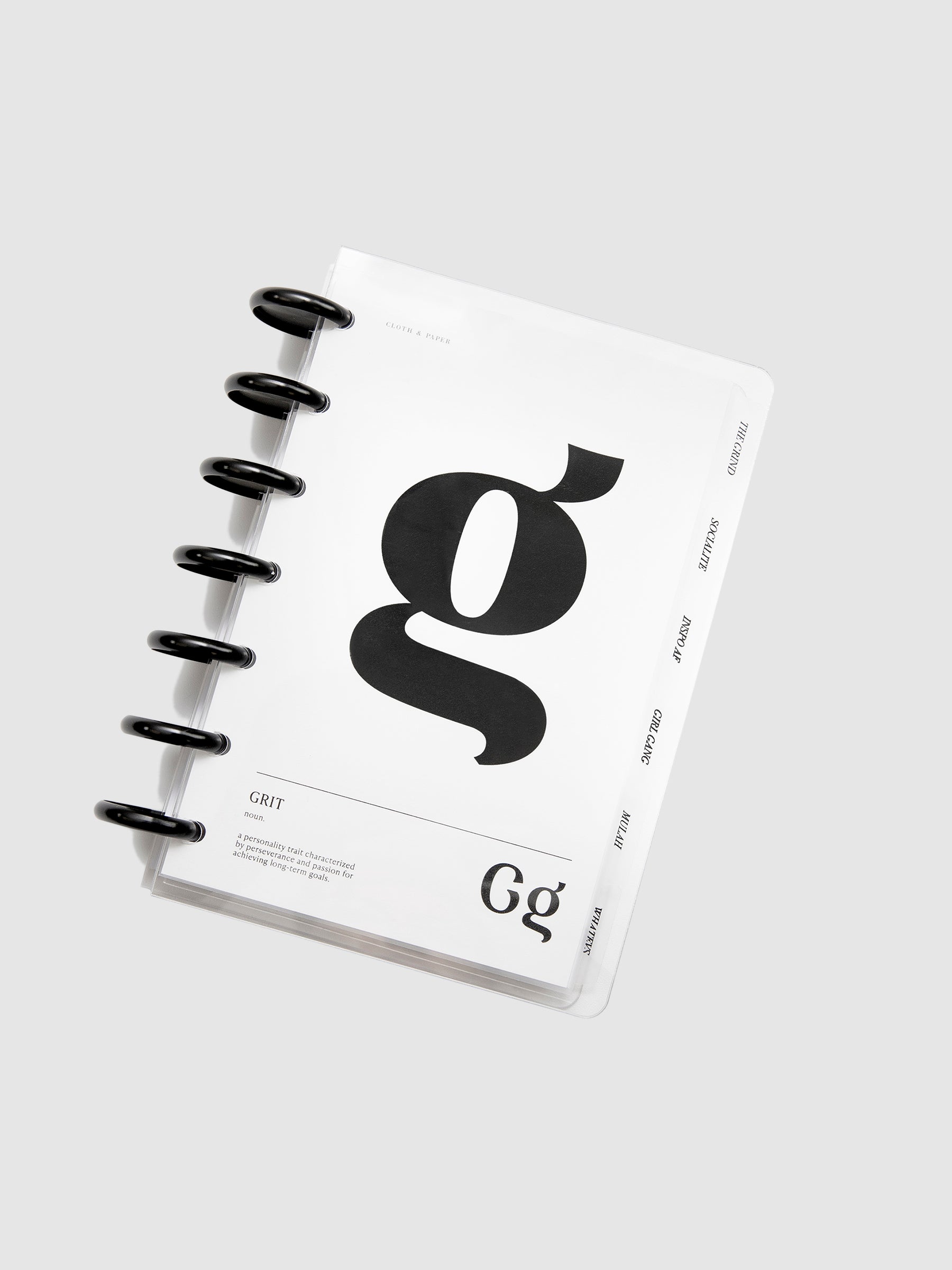 Planner Discs, 1.25 Inch, Black, Cloth and Paper. Black aluminum planner discs in use, holding together an HP Mini size planner with a Grit dashboard.