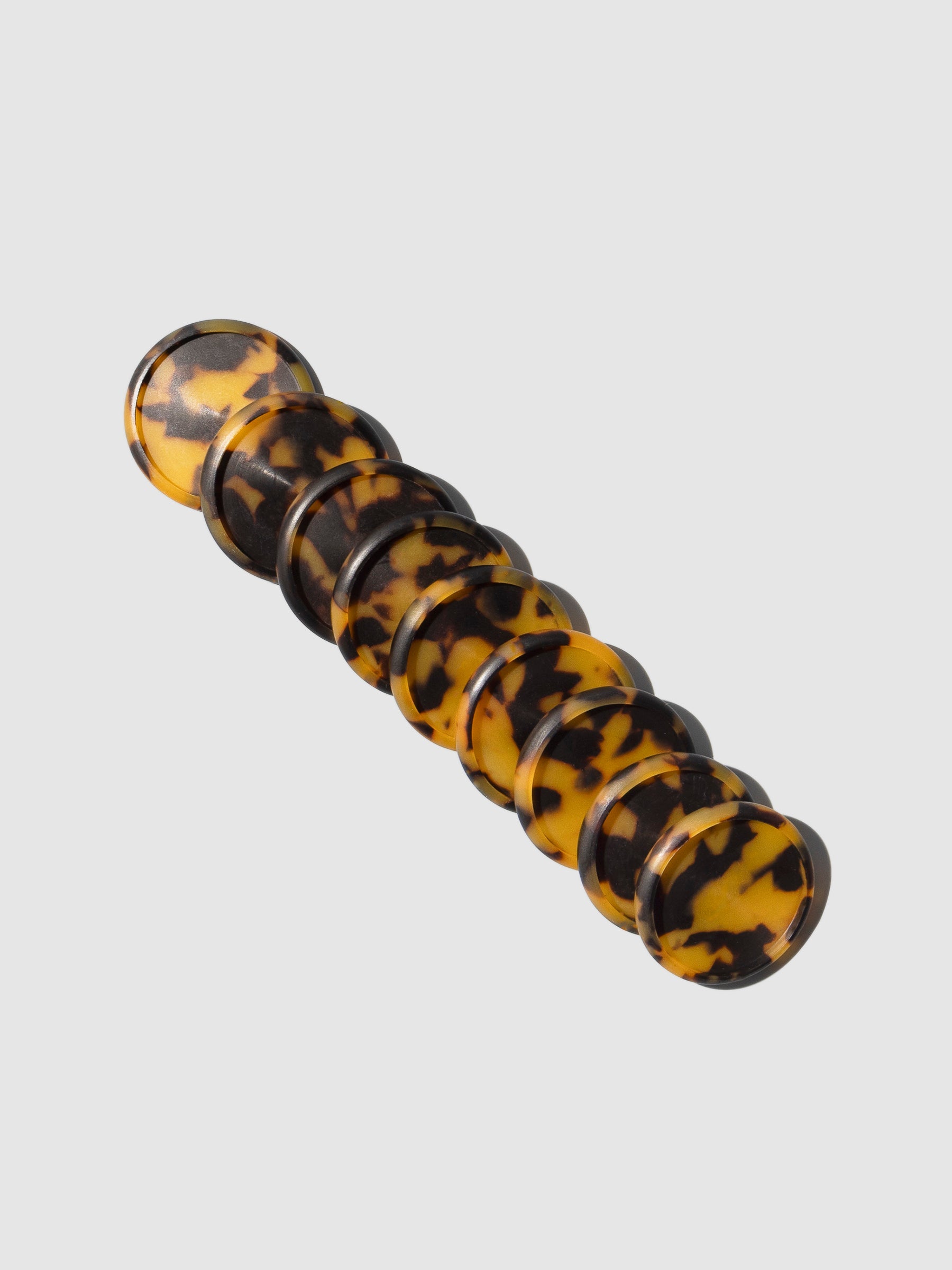 Planner Discs, Tortoiseshell, 1.5 inch, Cloth and Paper. Set of 9 discs on a neutral background.