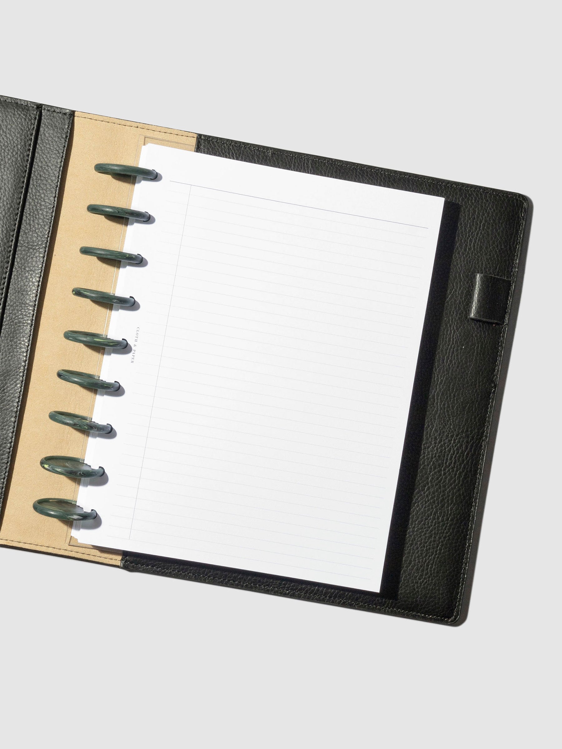 Set of 9 discs in use inside a black leather folio.