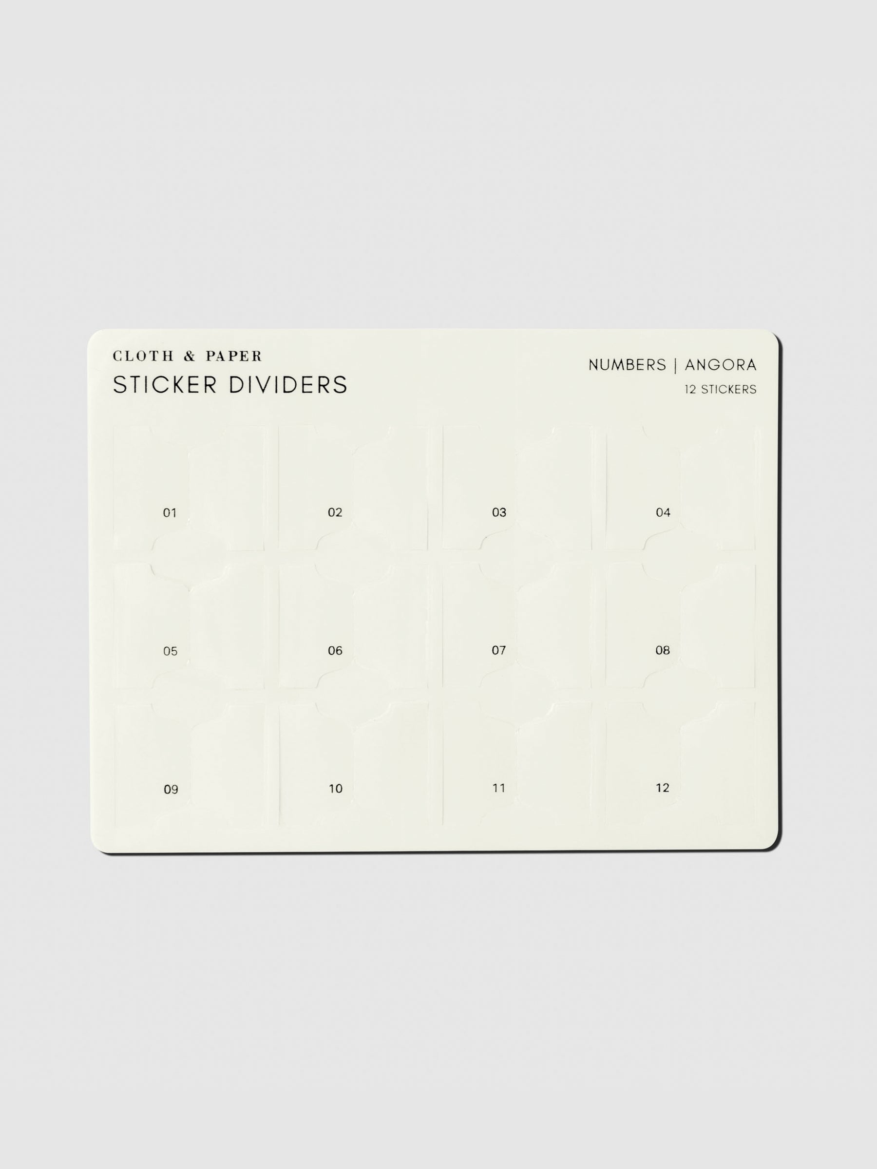 Sticker sheet displayed on a neutral background. Design shown is Numbers in the color Angora.