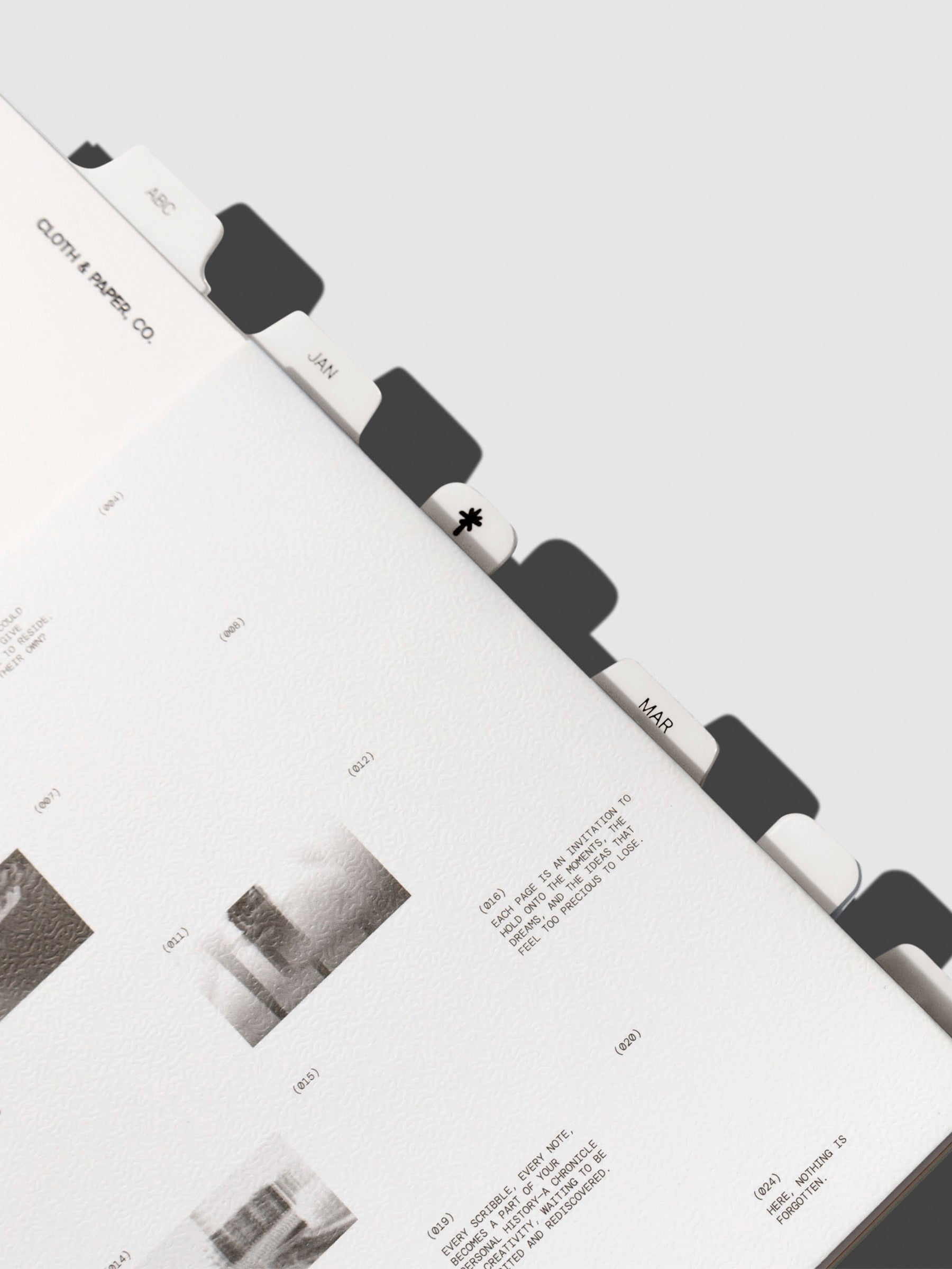 Aspen subdividers shown in use inside a notebook alongside full size tabs.