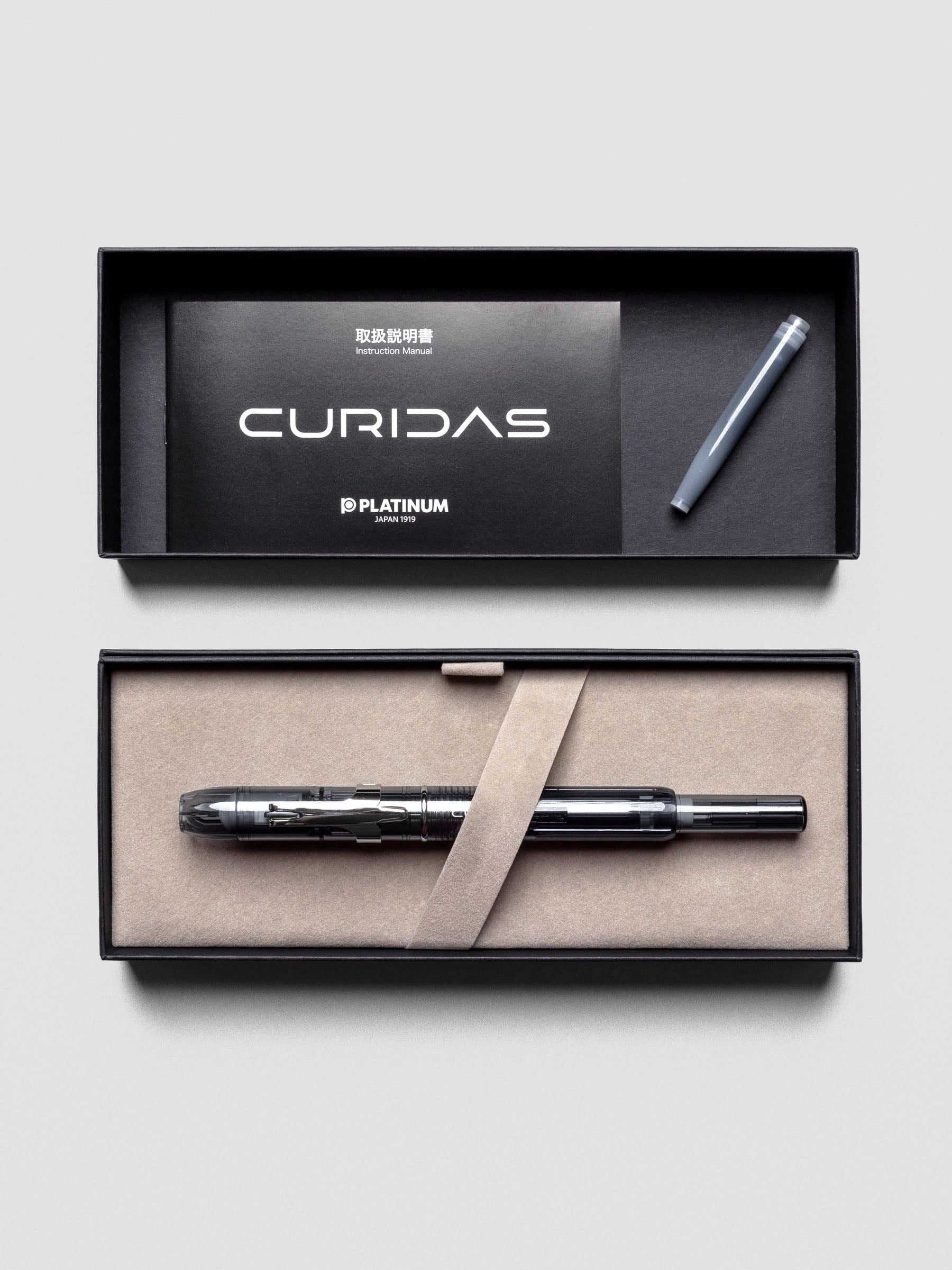 Detail of Platinum Curidas Graphite Smoke Fountain Pen with medium nib extended.