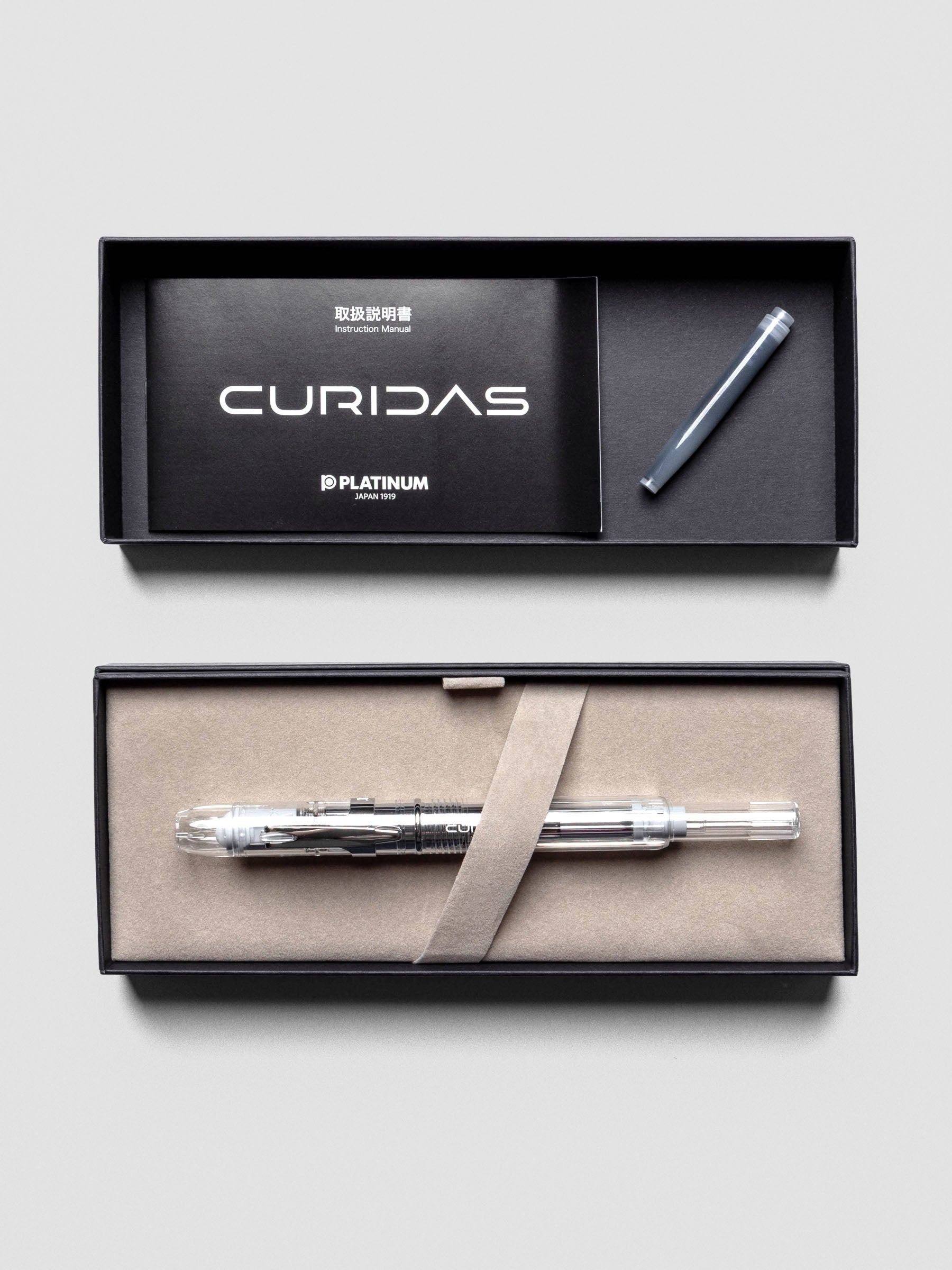 Detail view of Platinum Curidas Prism Crystal Fountain Pen with translucent barrel.