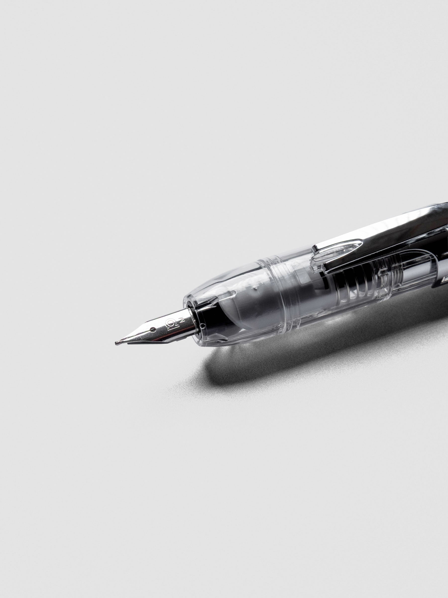 Close-up of Platinum Curidas Prism Crystal Fountain Pen with medium nib extended.