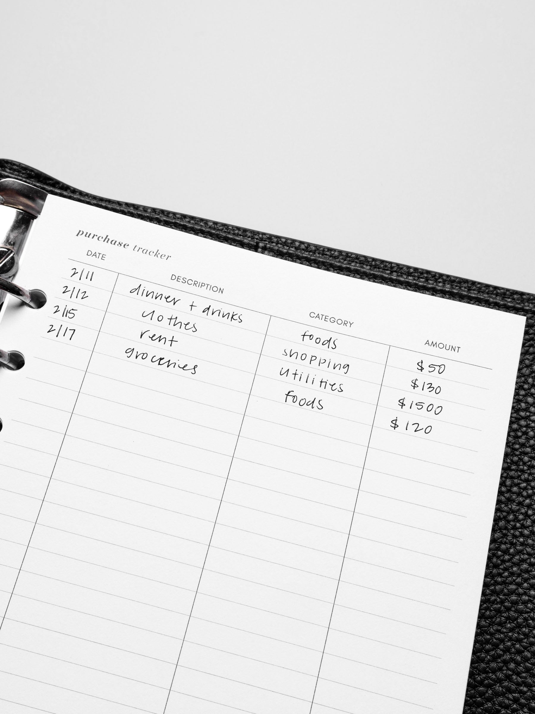 Insert in use inside a black leather planner.