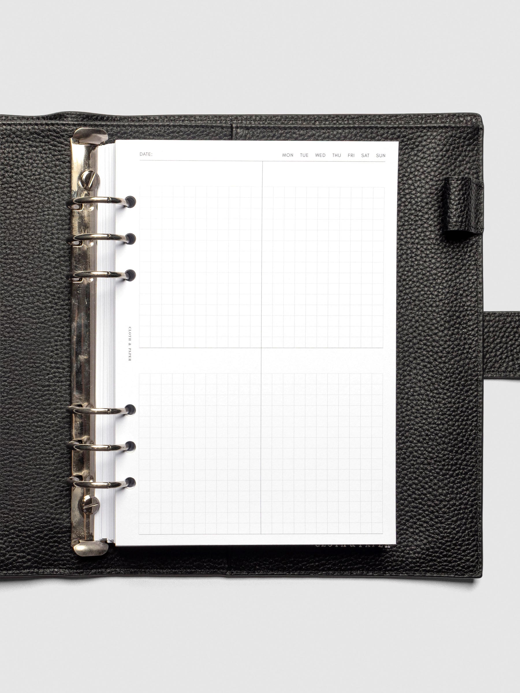 Insert in use inside a black leather planner.
