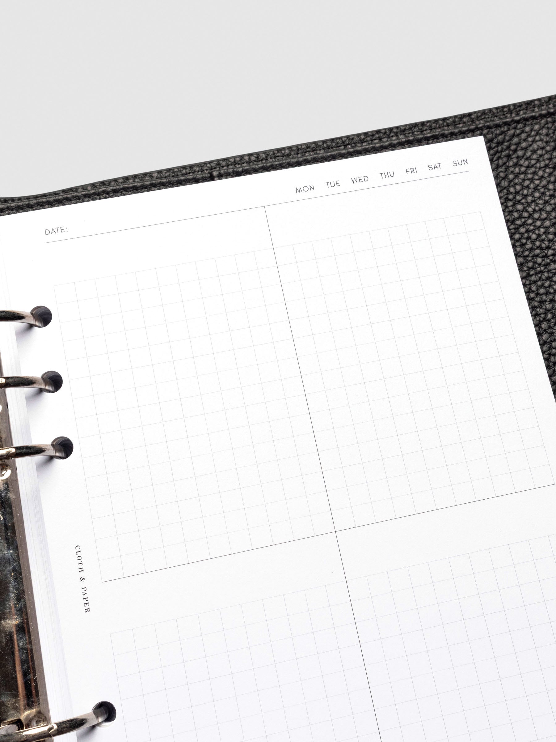 Insert in use inside a black leather planner.
