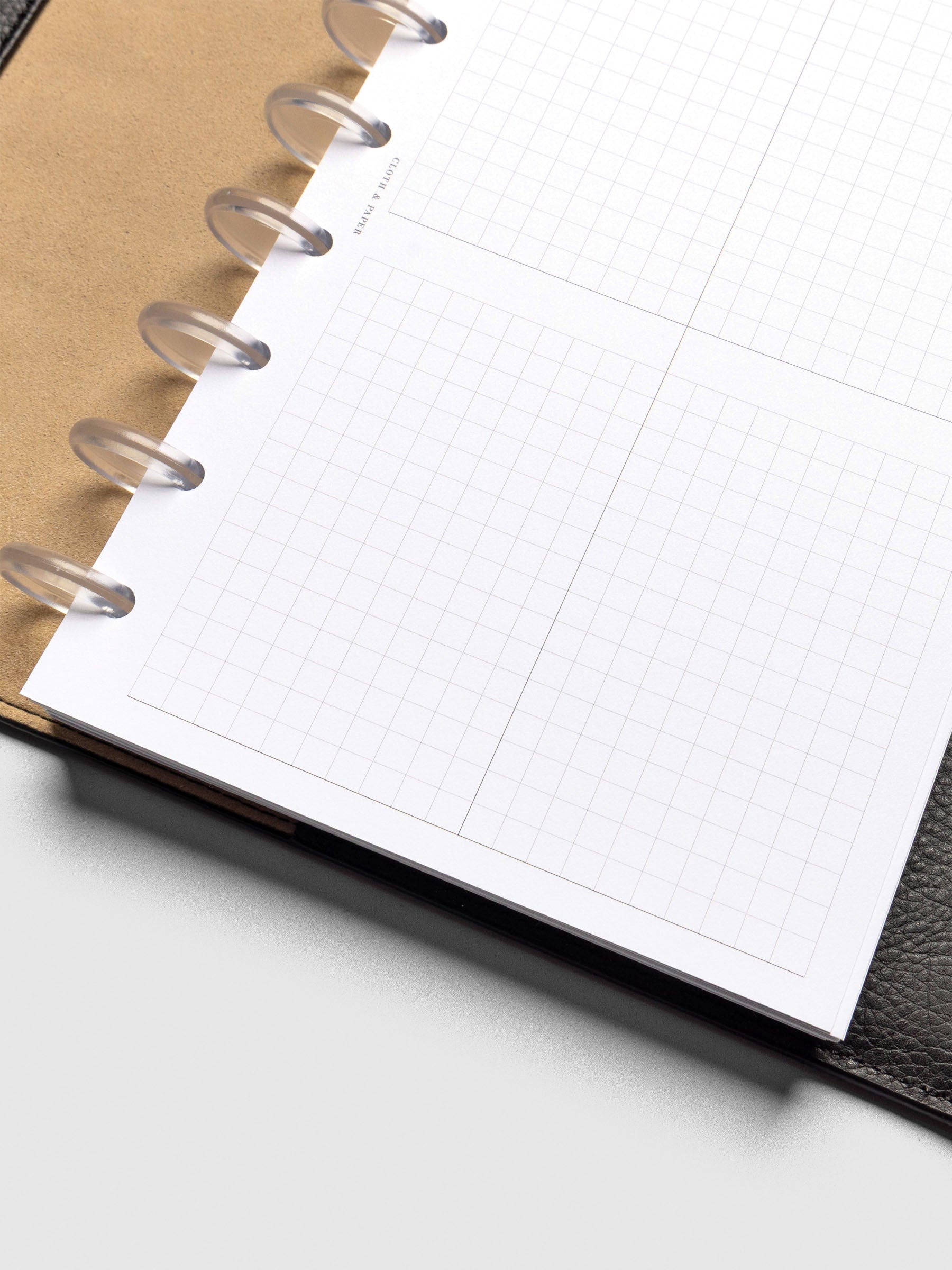 Insert in use inside a black leather planner.