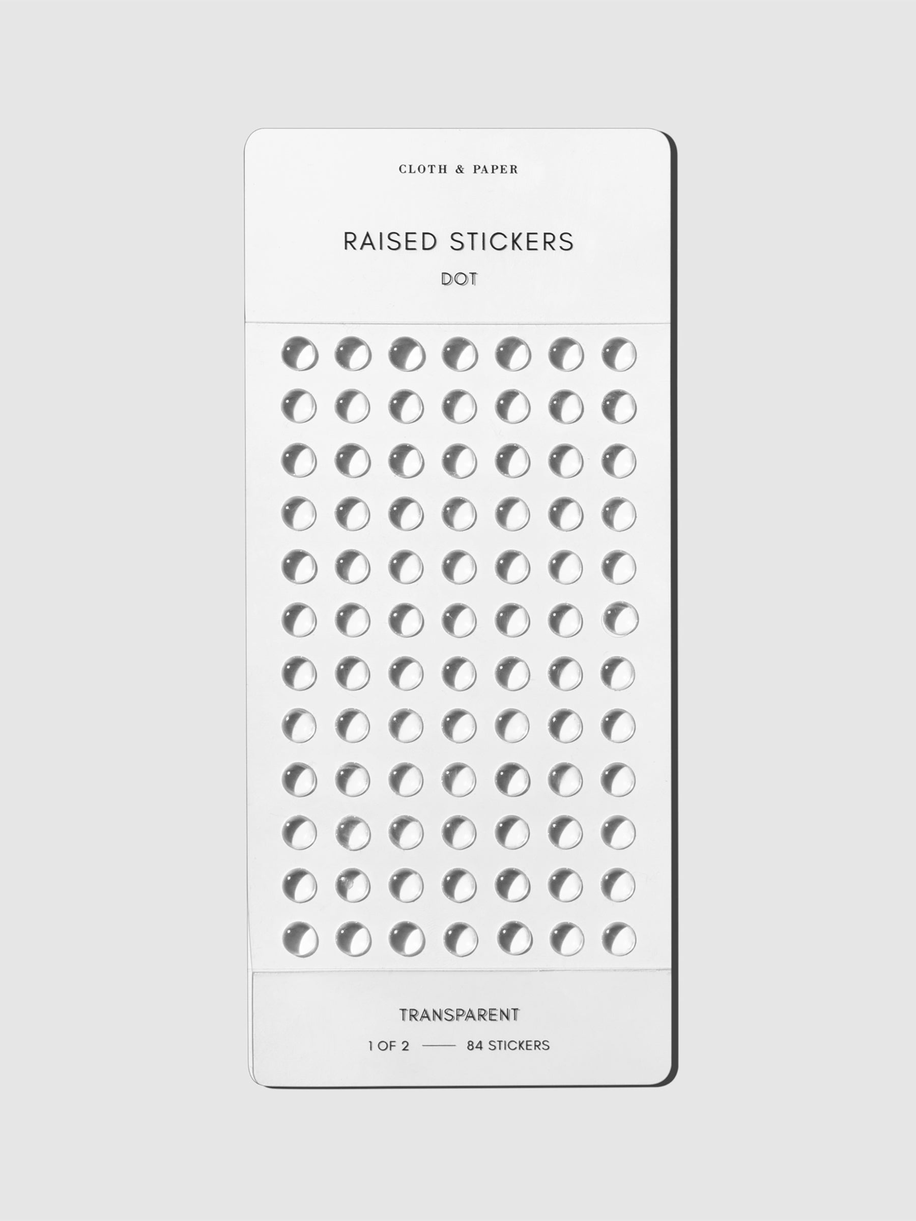 Dot stickers displayed on a neutral background.