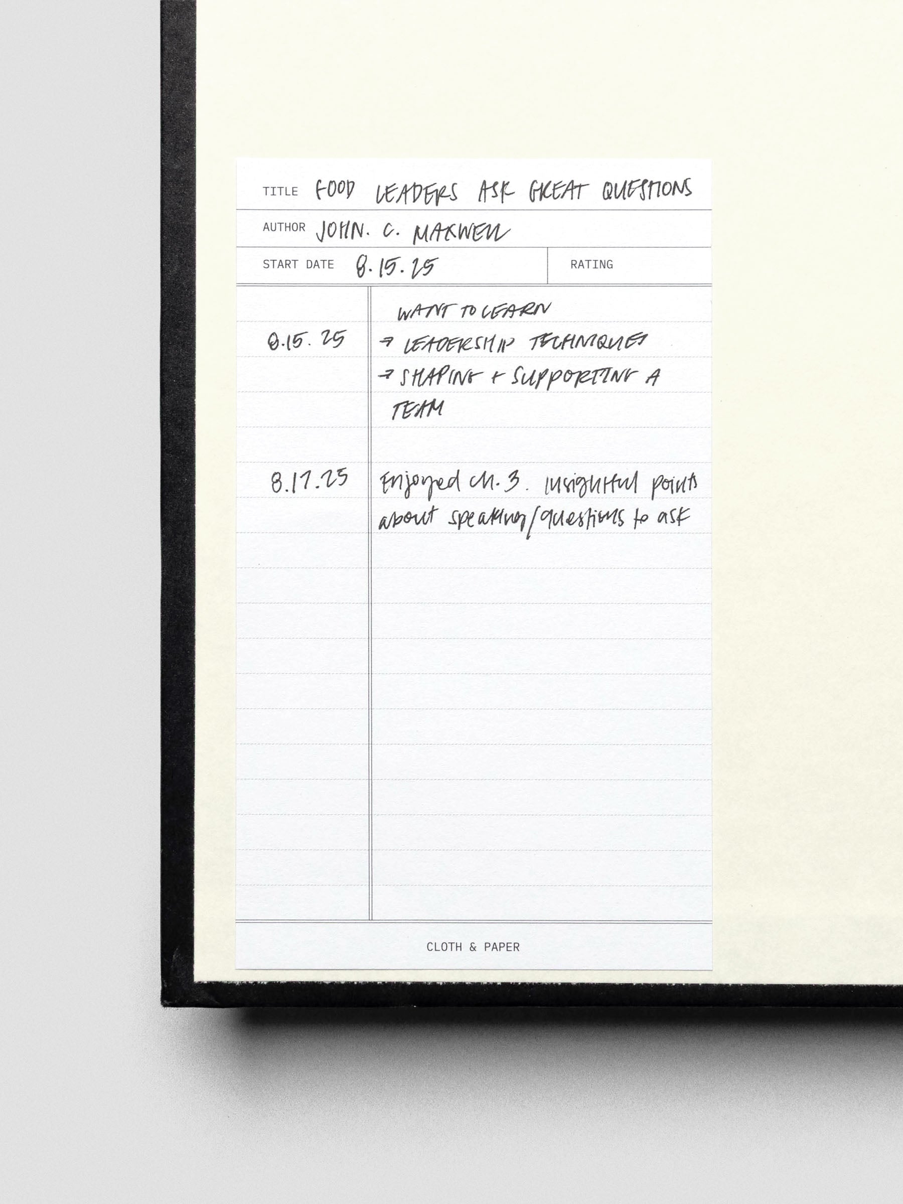 Read sticky note shown adhered to inside of book cover with handwritten notes.