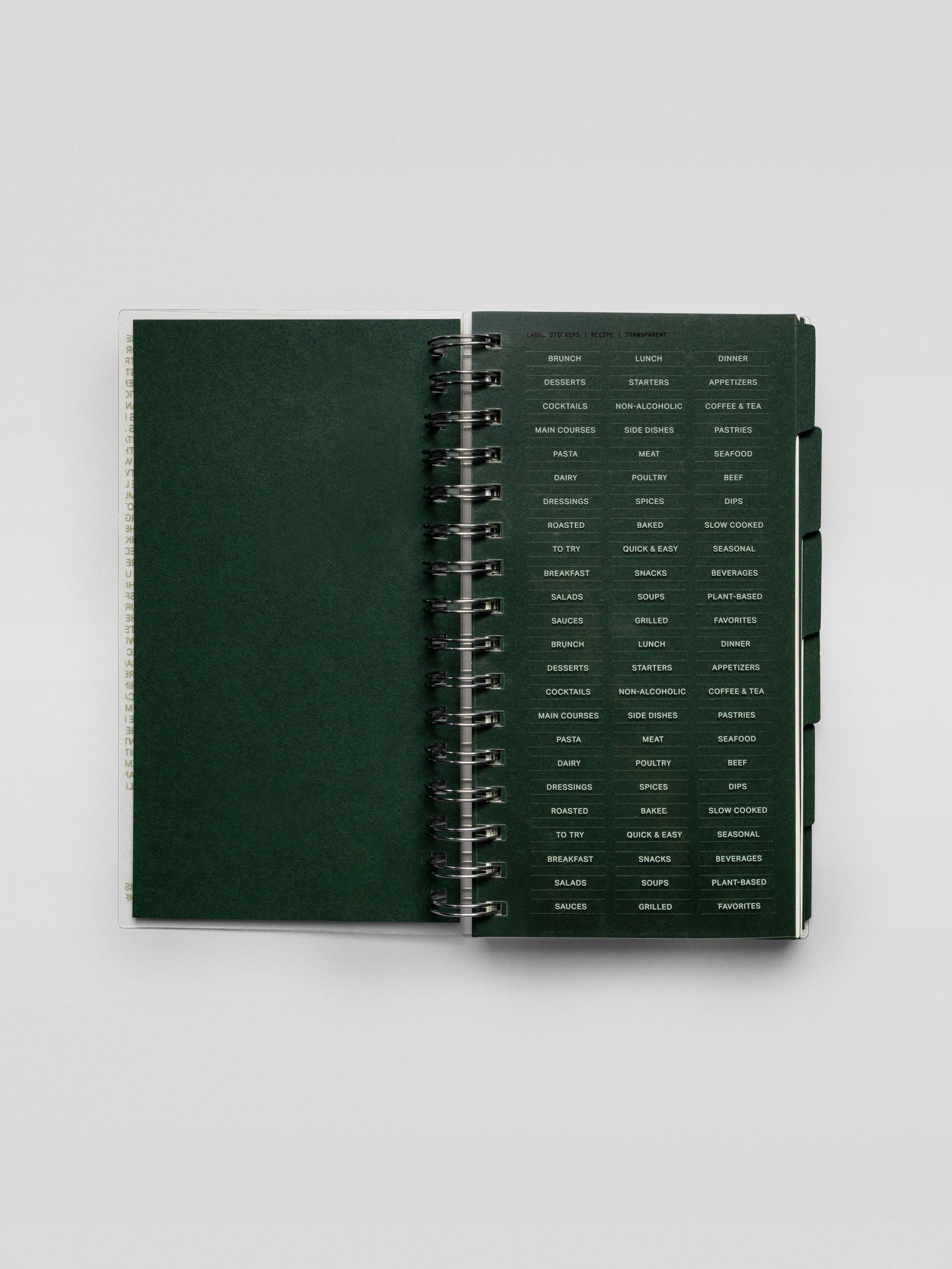 Open Recipe Book System displaying transparent label stickers with various recipe category names printed in white text.