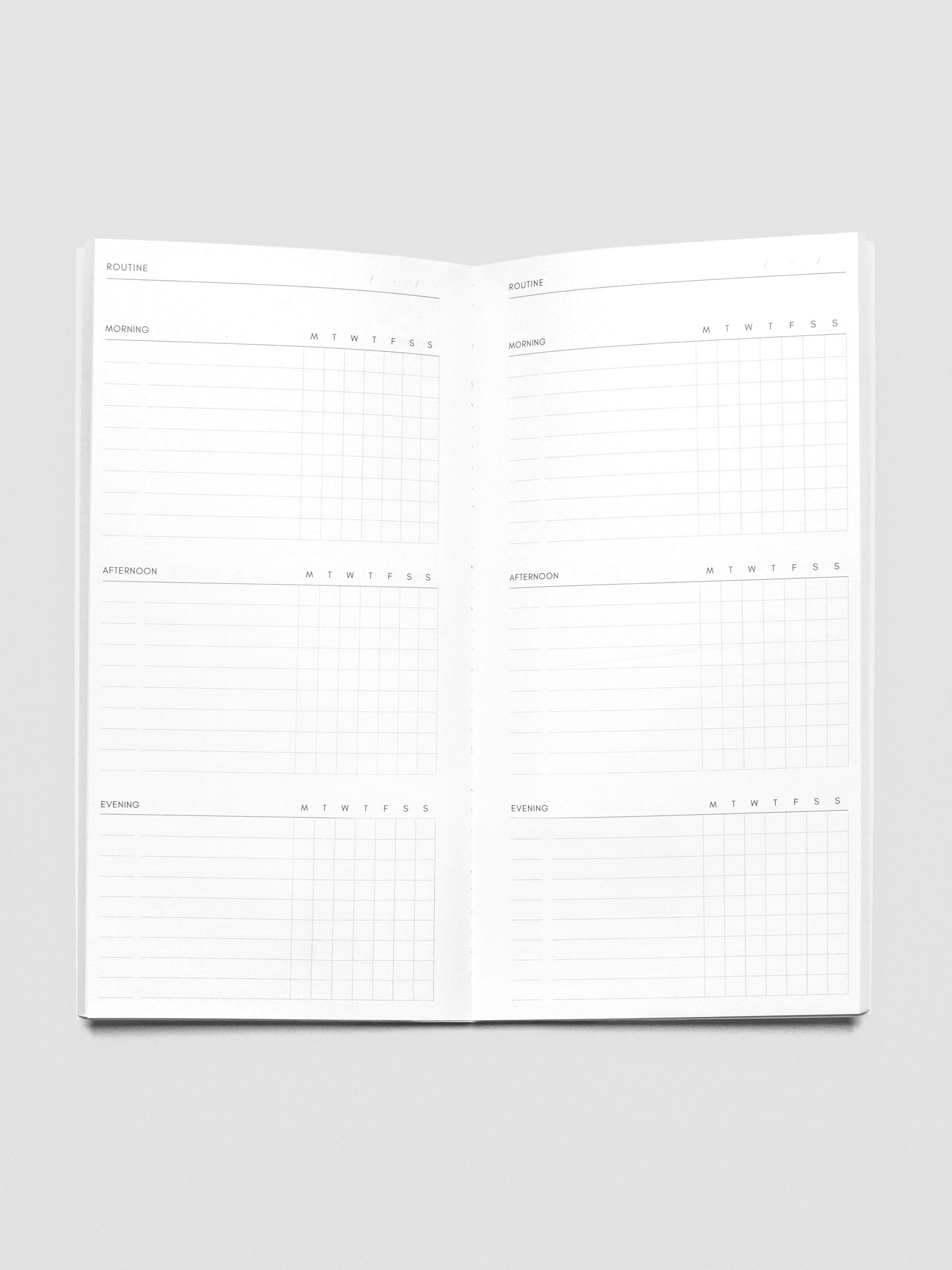 Travel Notebook in size A5 Slim in color Beignet with Routine Builder pages with inner pages shown.