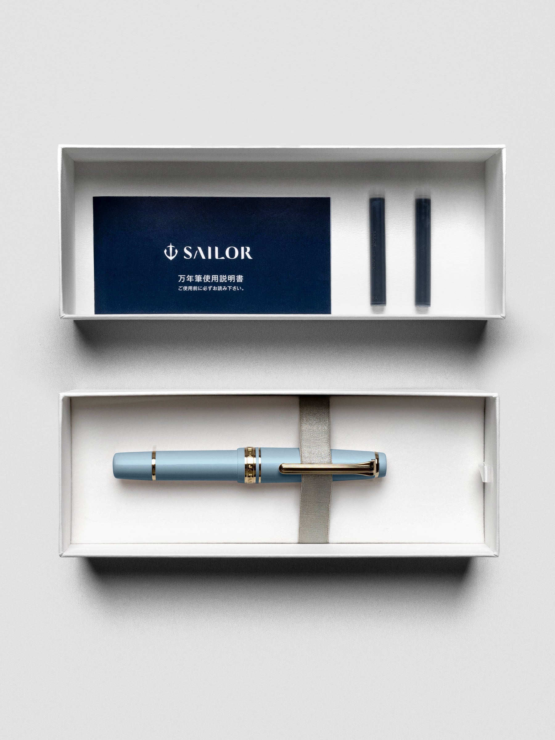 Sailor Pro Gear Slim Mini Fountain Pen in Ayur Blue, shown capped.