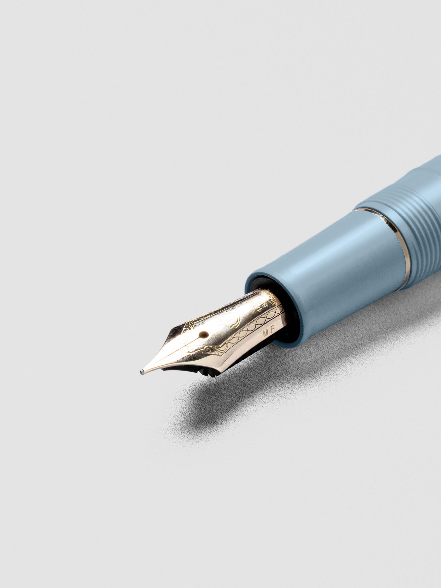 Close-up of Sailor Pro Gear Slim Mini Fountain Pen nib in Ayur Blue finish.