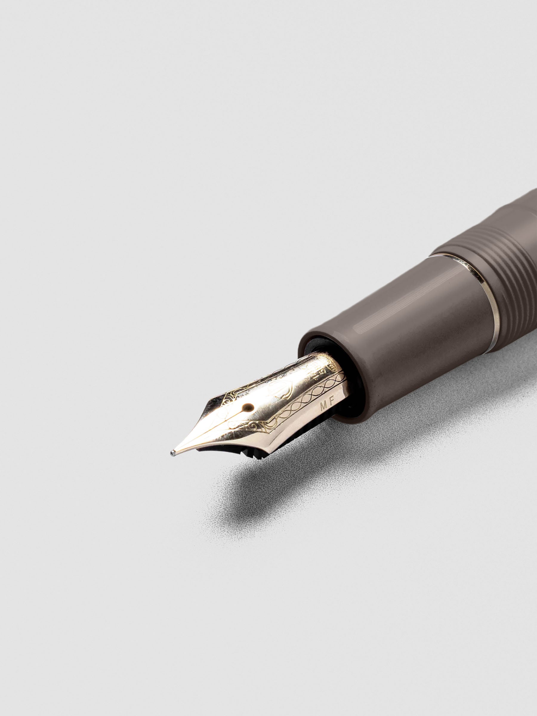 Close-up of Sailor Pro Gear Slim Mini Fountain Pen nib in Puff Brown finish.