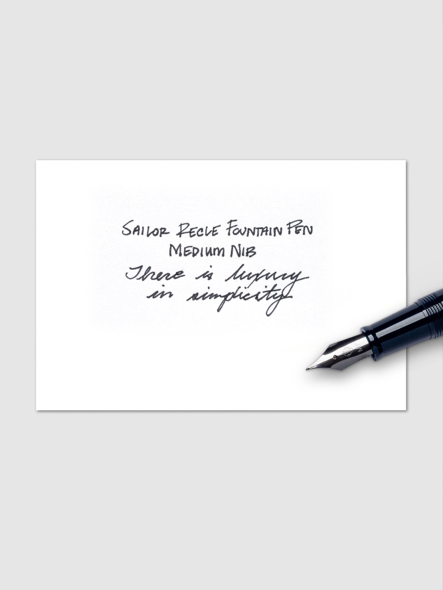 Sailor Recle Fountain Pen Medium in Iron Blue uncapped, angled to display details.