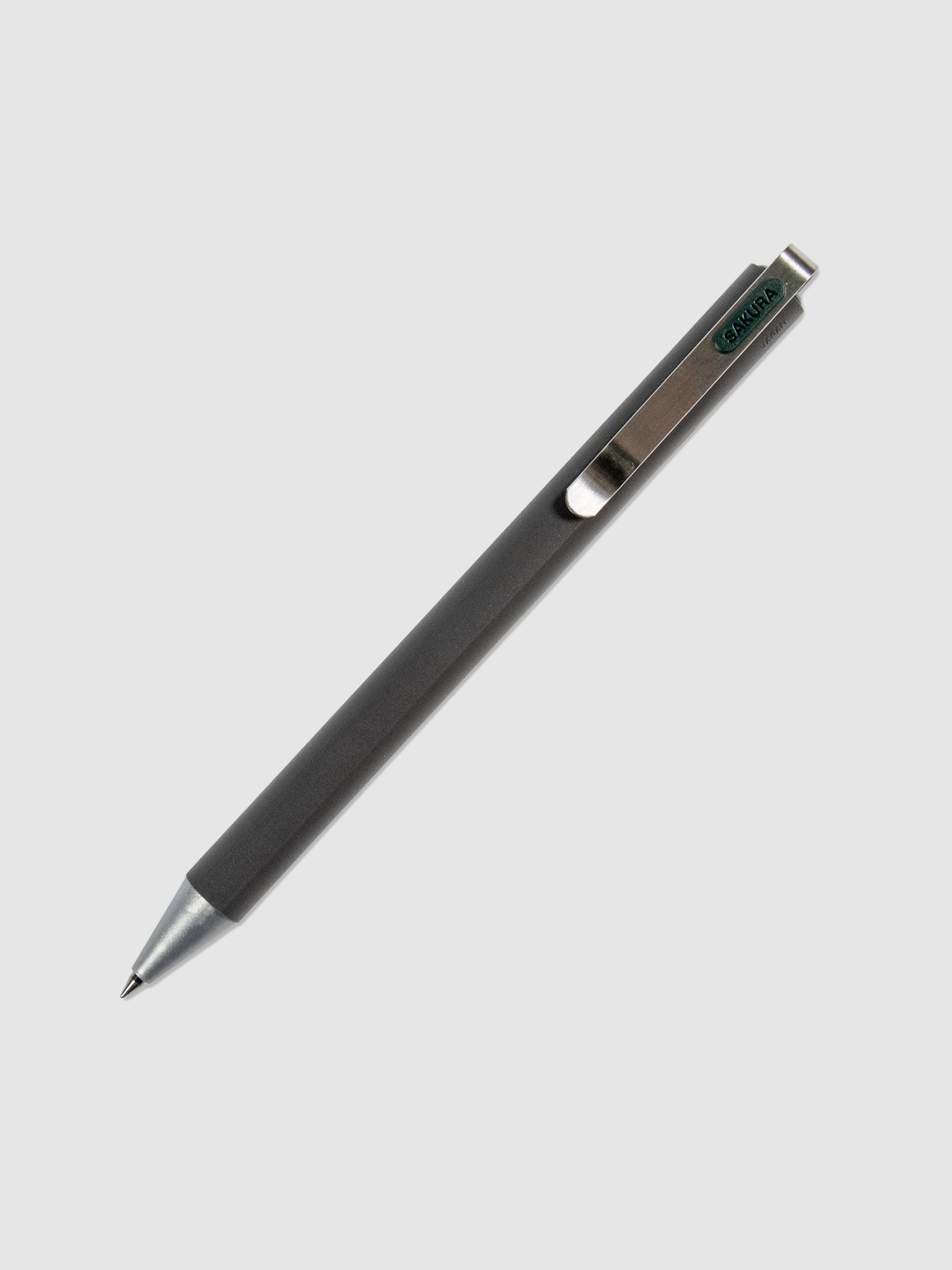 Pen in Green Black turned to the right against a neutral background.