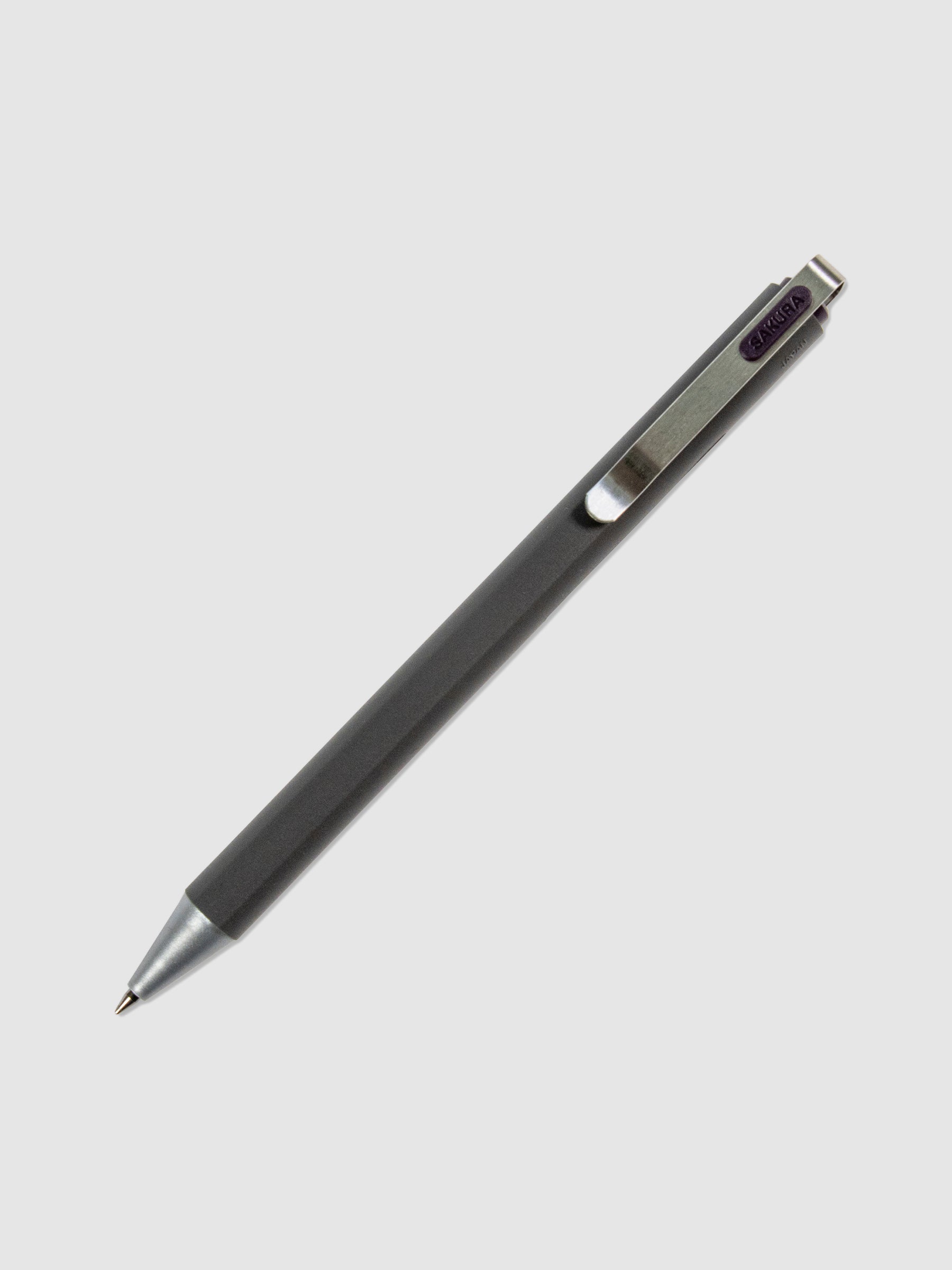 Pen in Purple Black turned to the right against a neutral background.