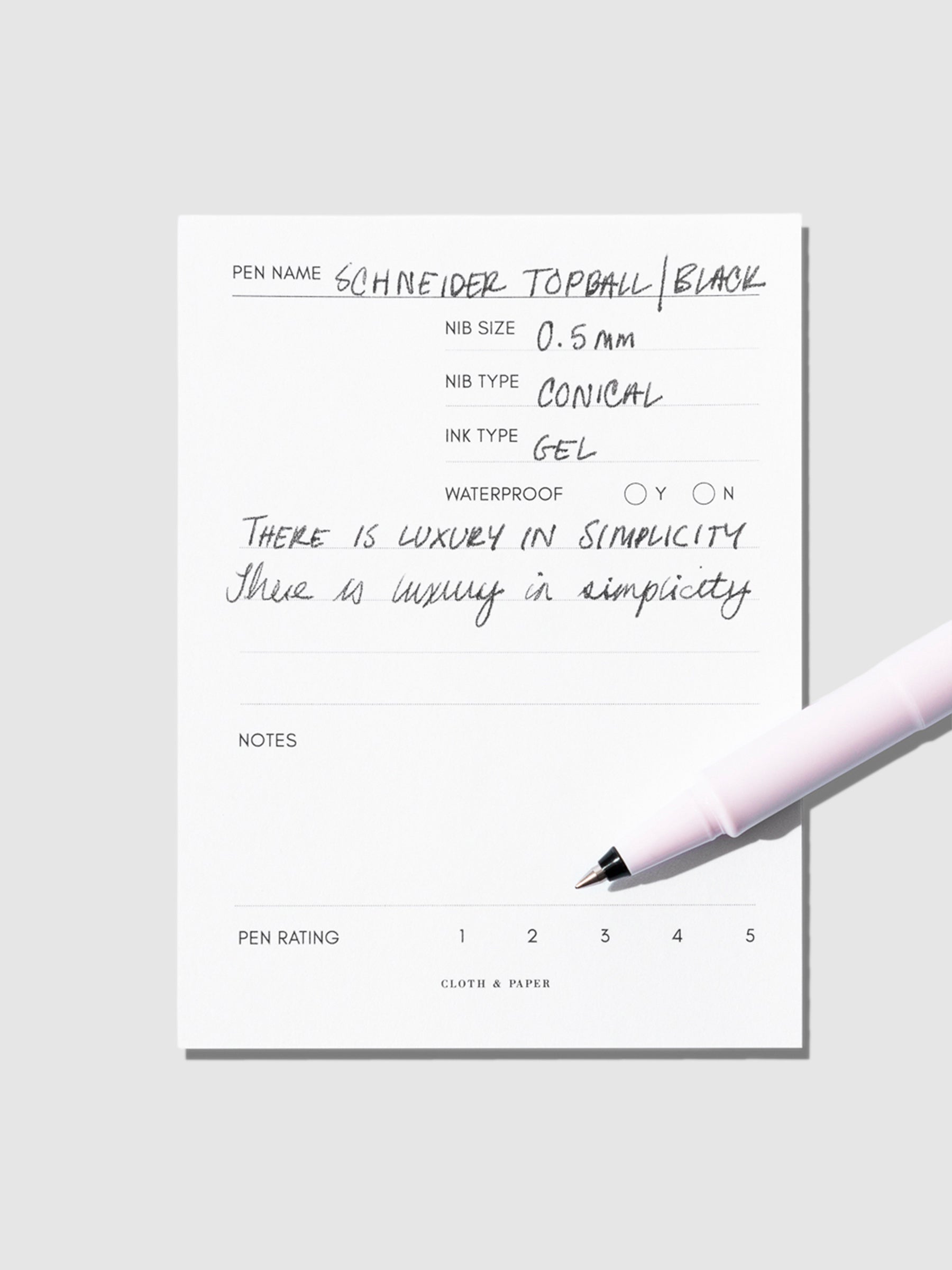 Pen displayed on an in use pen testing sheet.