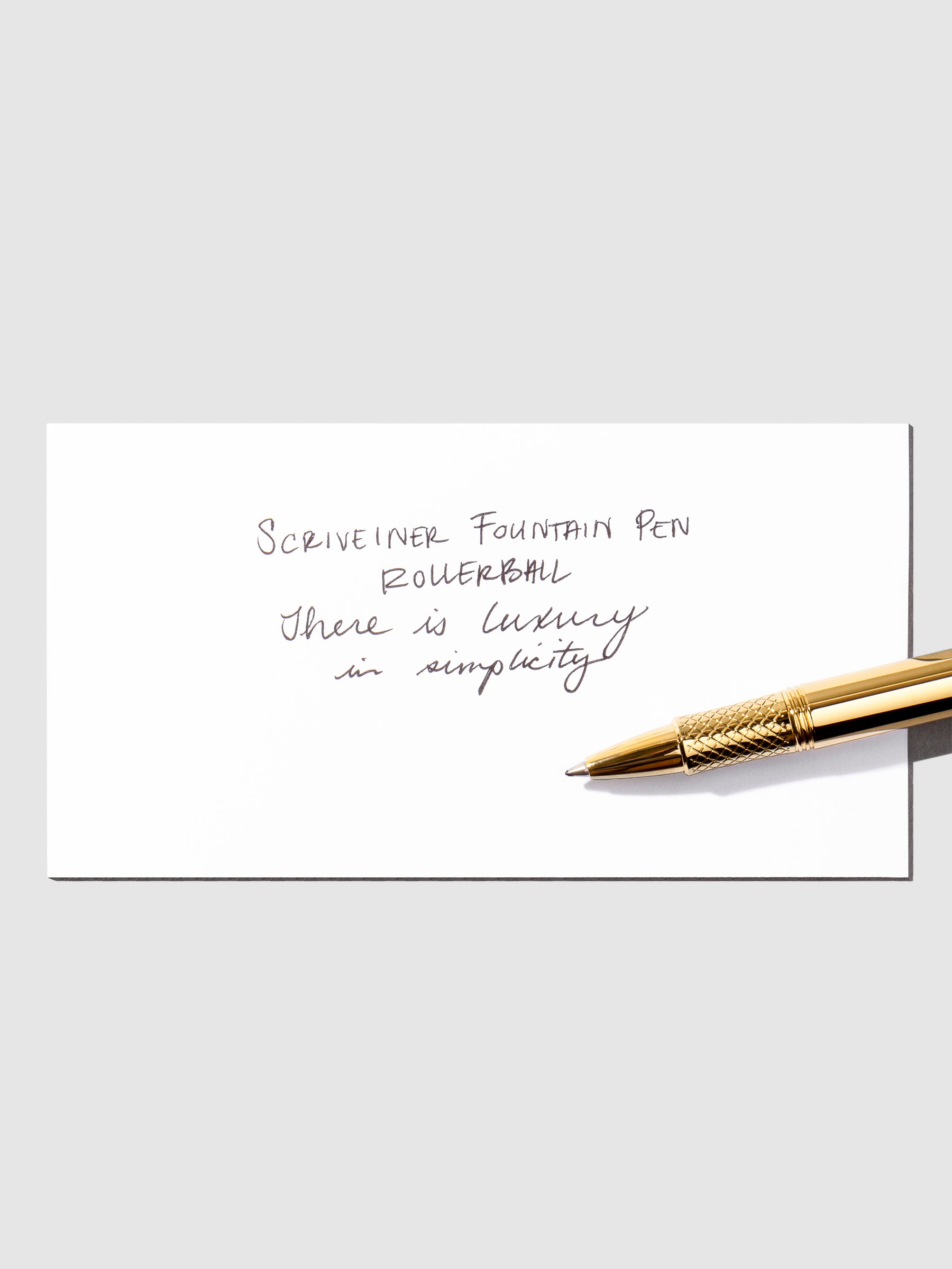 Scriveiner rollerball pen refill black EDC Gold sample writing.