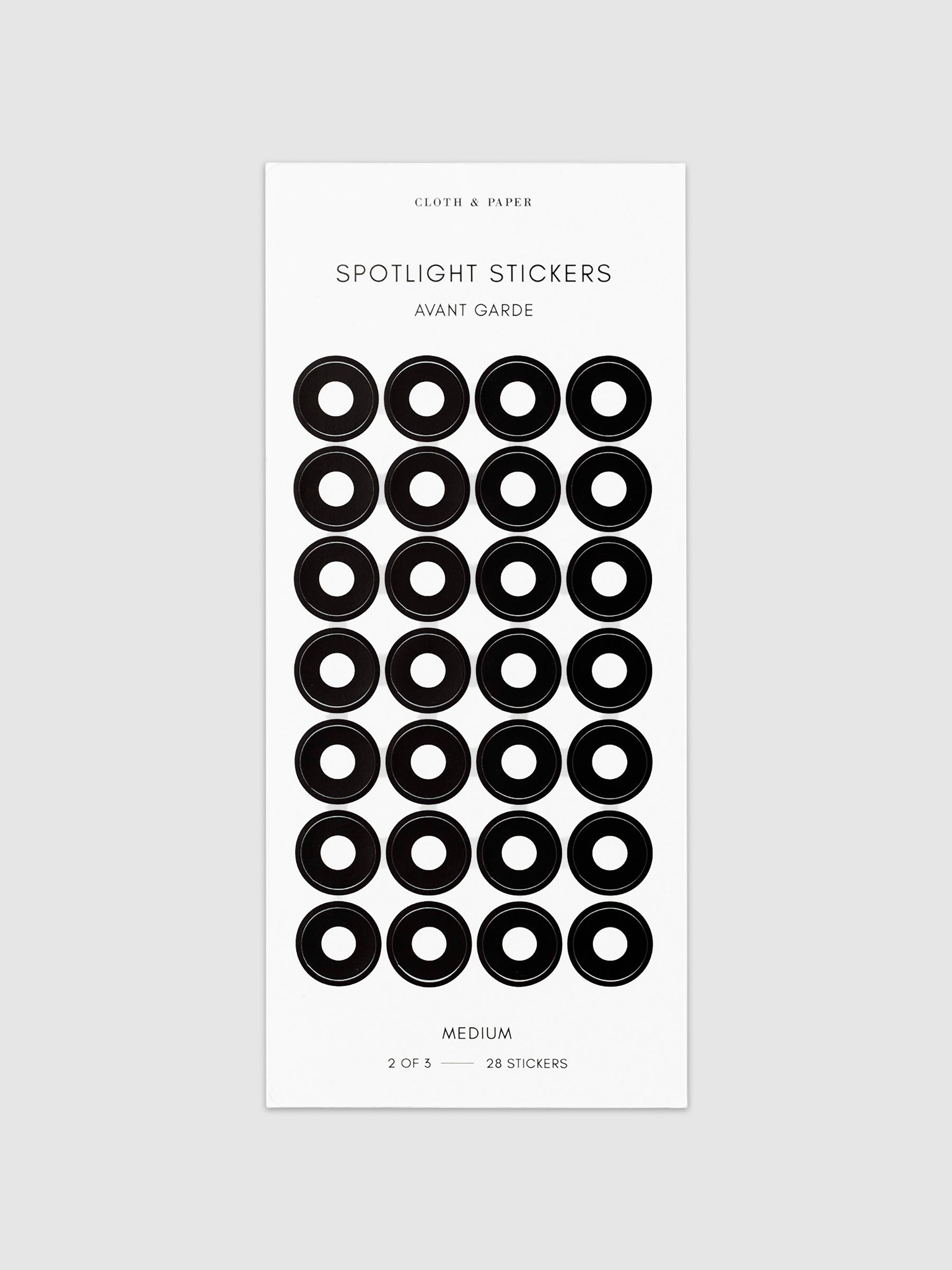 Medium sticker in its packaging displayed on a neutral background. Pictured color is avant garde.