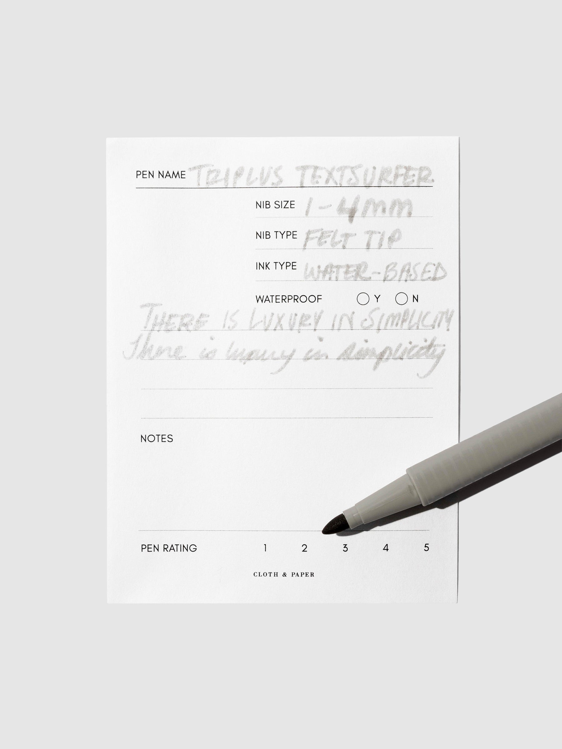 Highlighter shown on an in use pen testing sheet. Color shown is grey. 