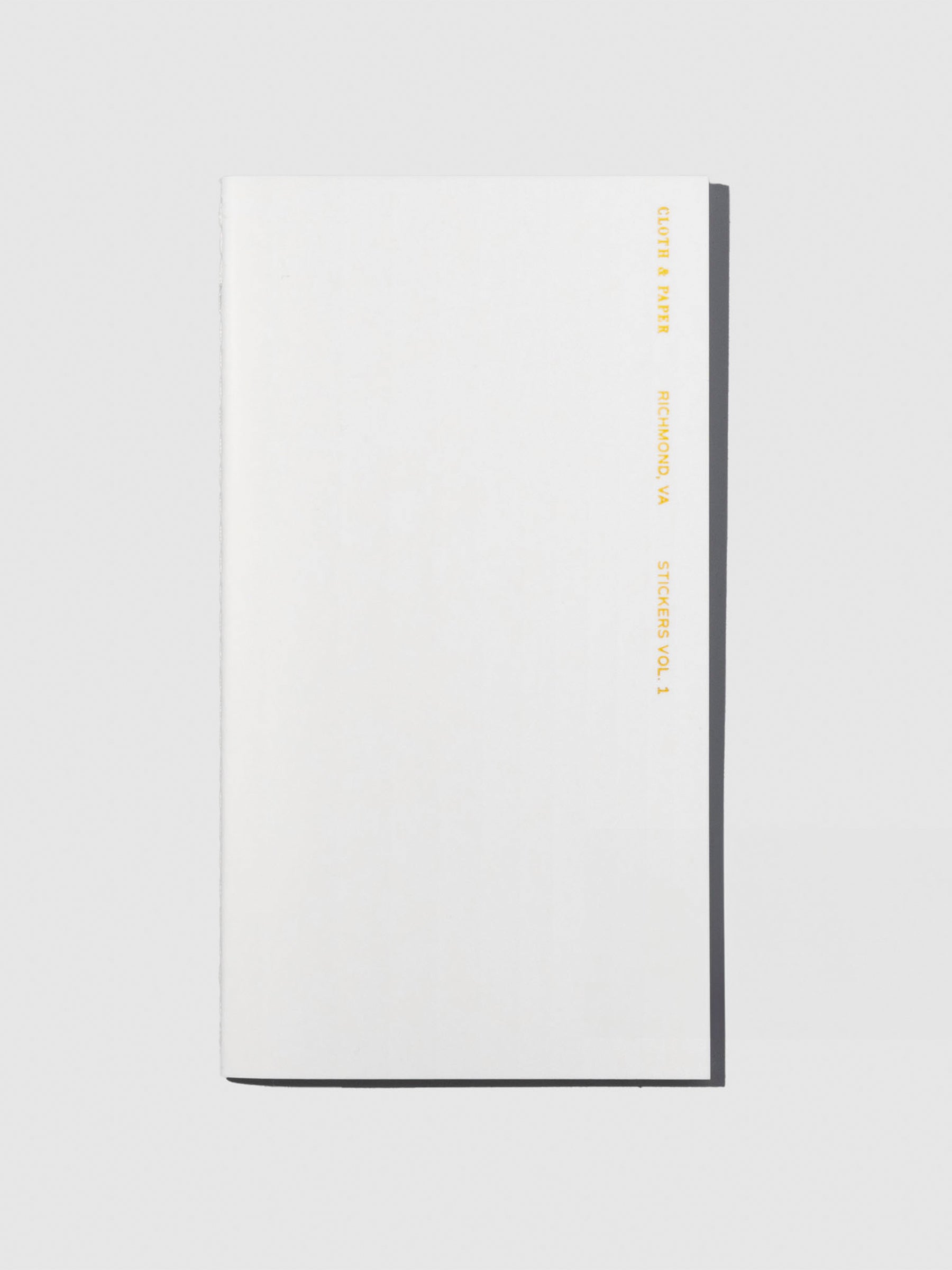 Sticker Book, Vol. 1, Pocket Plus, Cloth and Paper. Book shown on a neutral background.