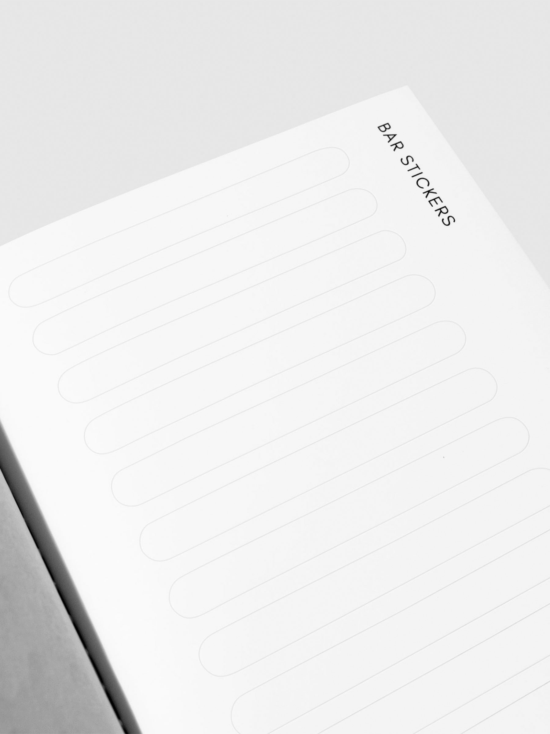 Closeup of white bar sticker page.