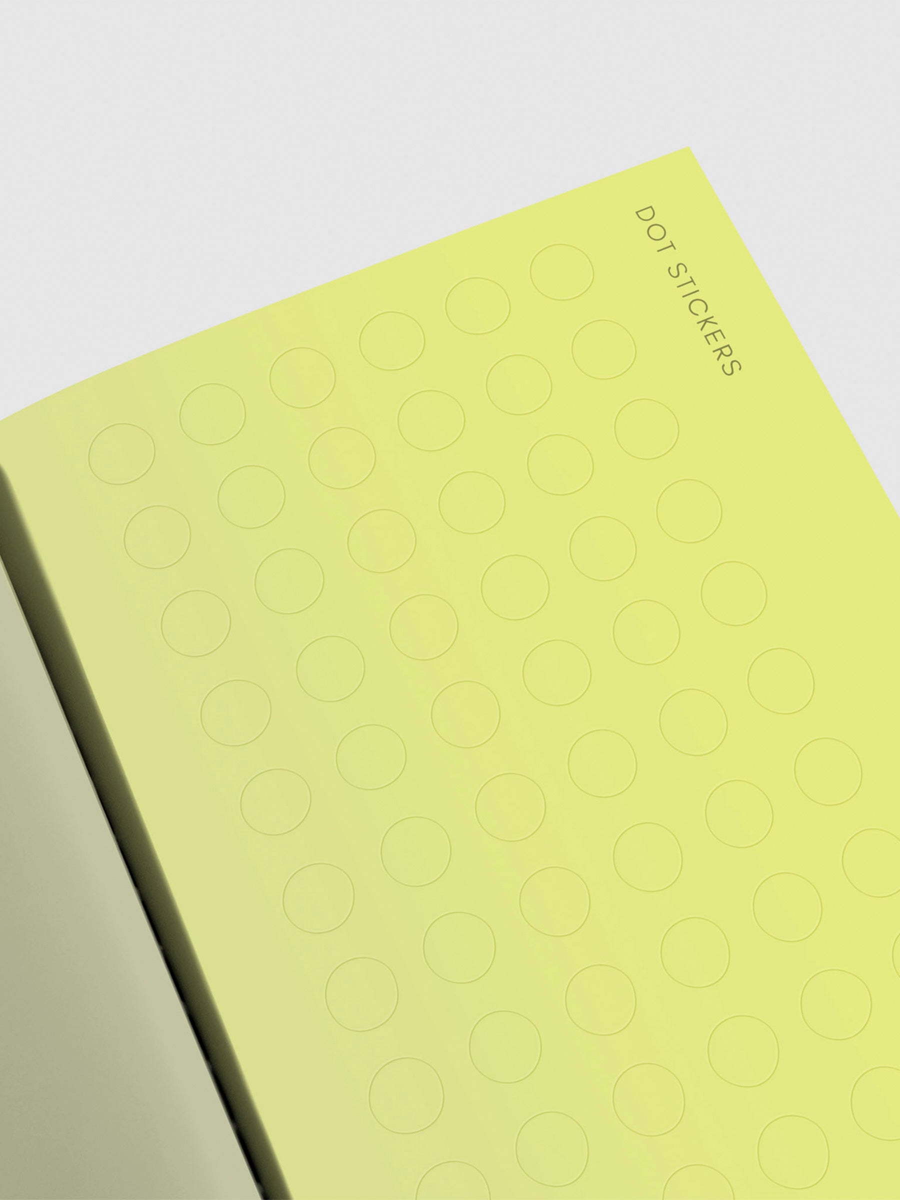 Closeup of yellow-green dot sticker page.