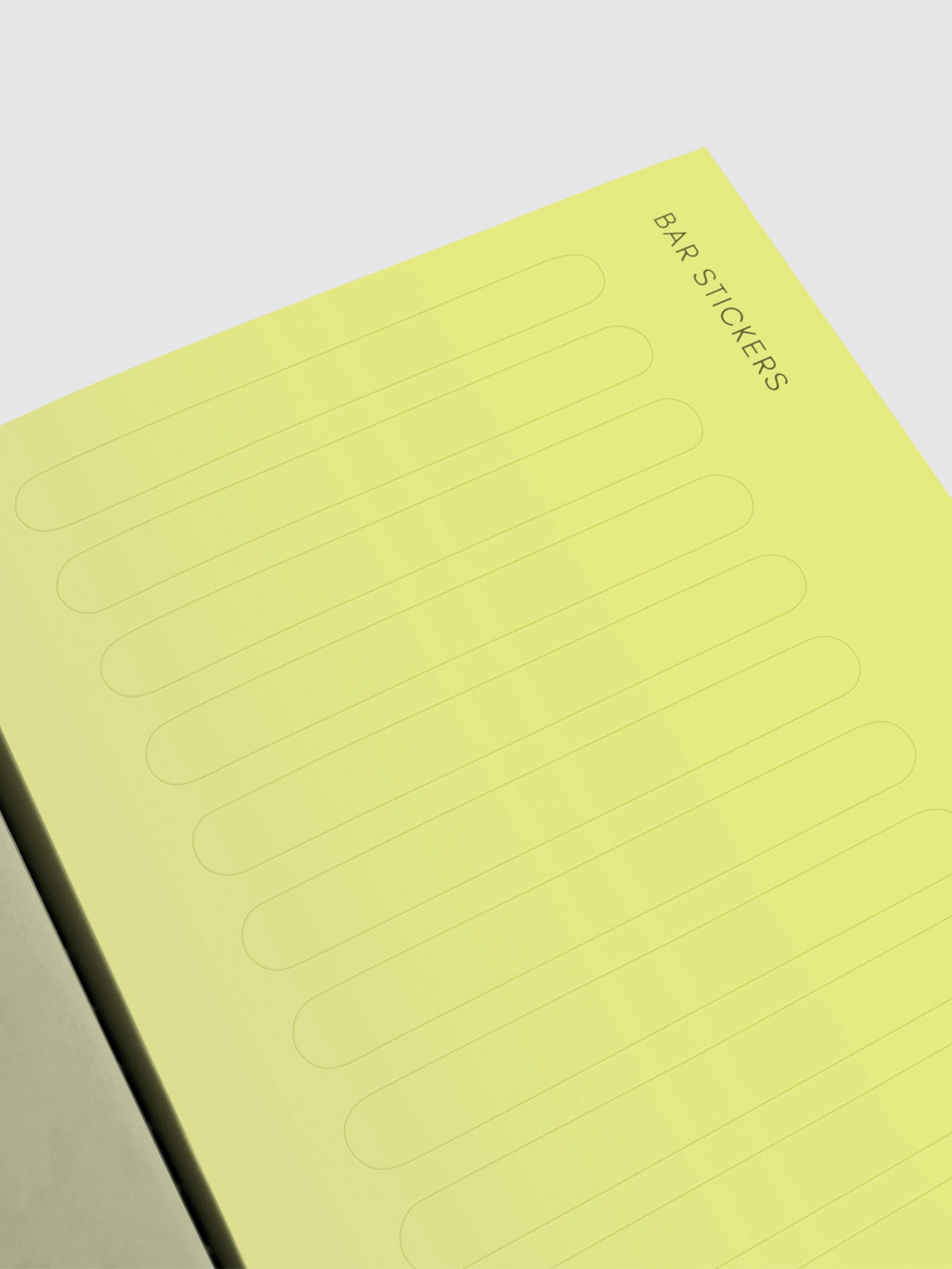 Closeup of yellow-green bar sticker page.
