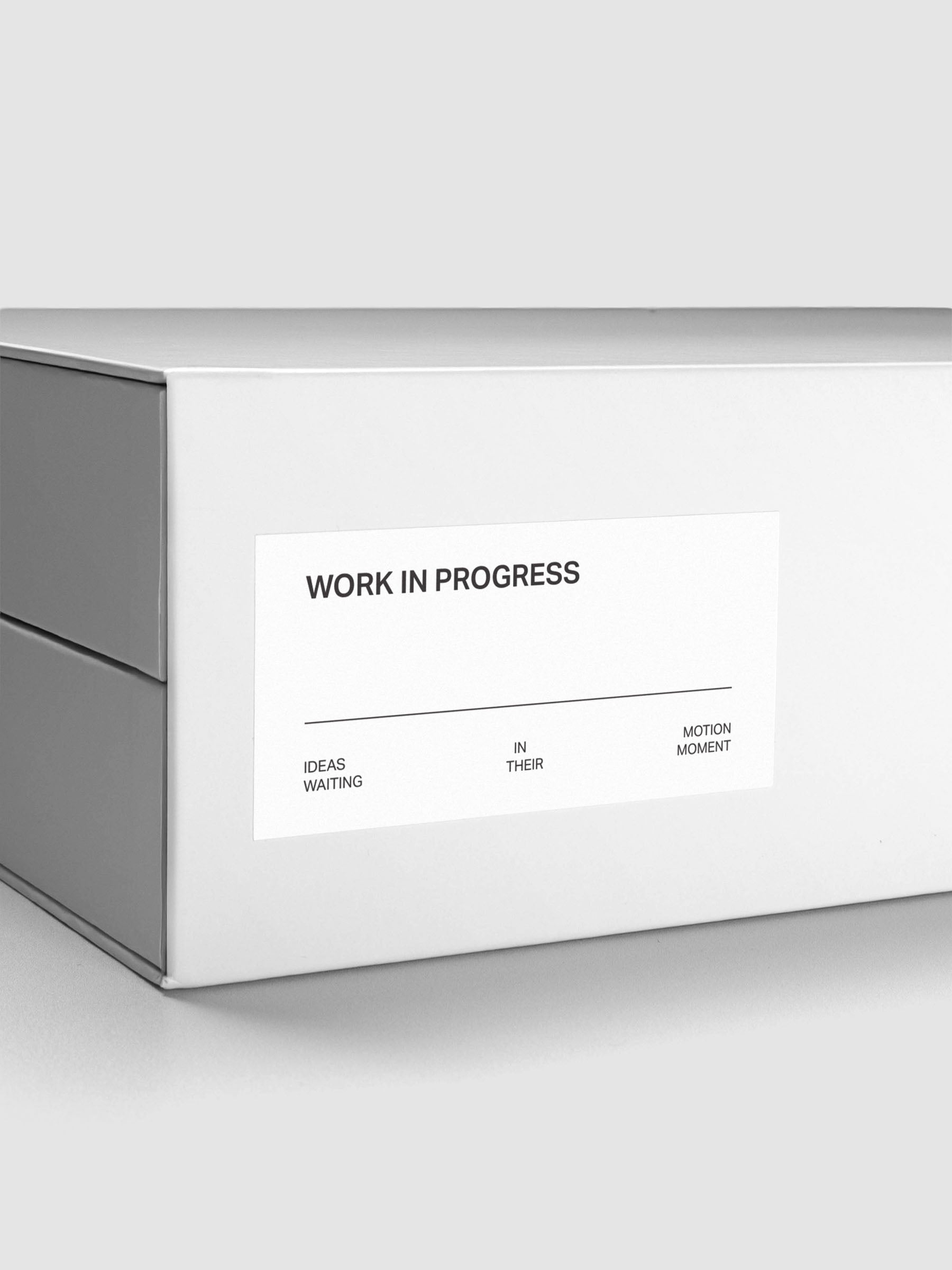 Close up view of the spine showing the Work In Progress label sticker applied to the exterior of the Storage Book 4.0.