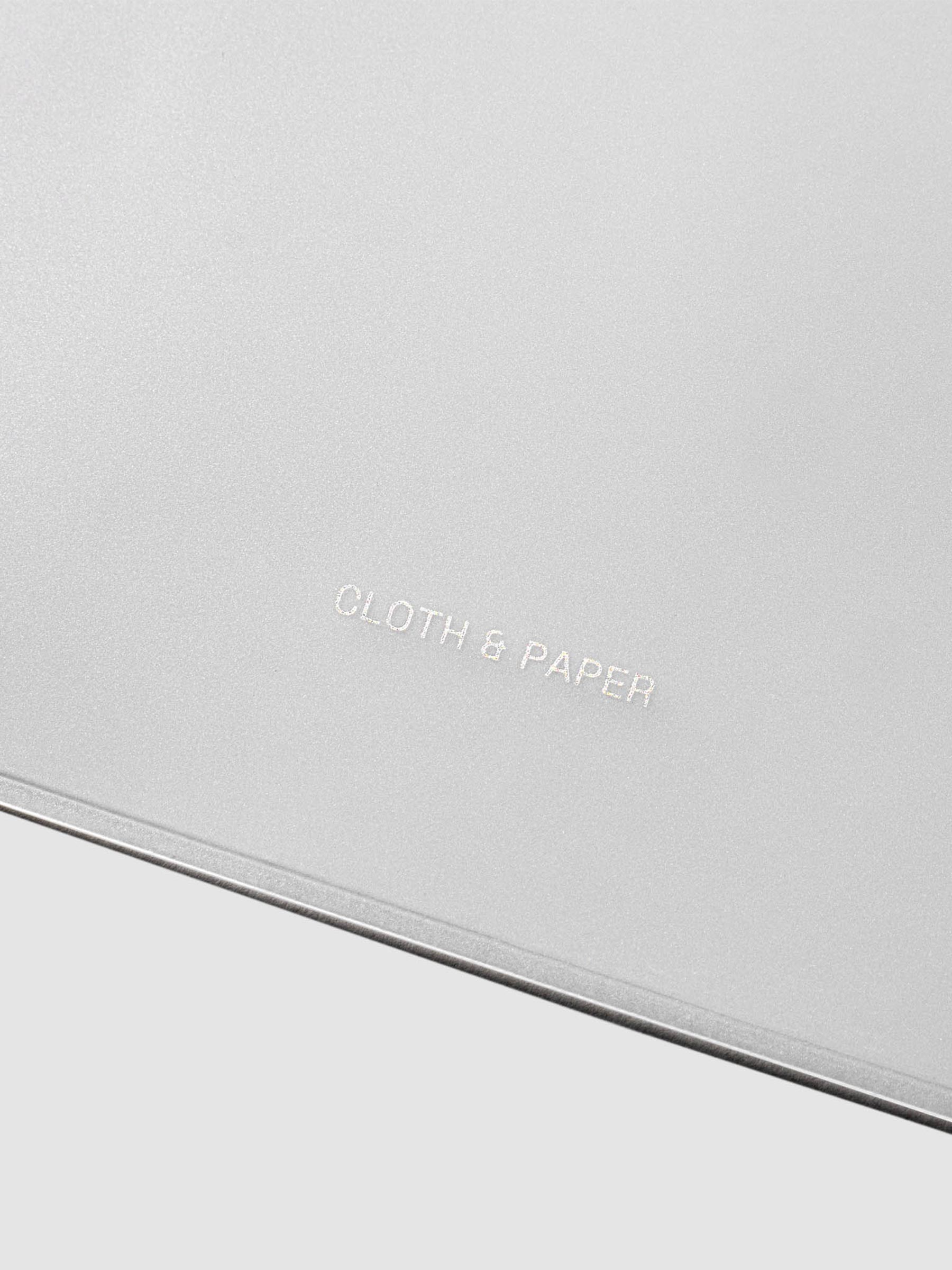 Closeup of Cloth and Paper logo printed on bag.