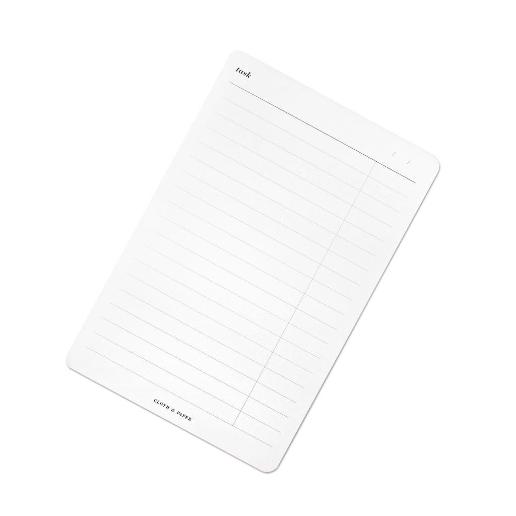 Task Notepad, Refreshed Layout, Cloth and Paper. Notepad tilted slightly to the right against a white background.