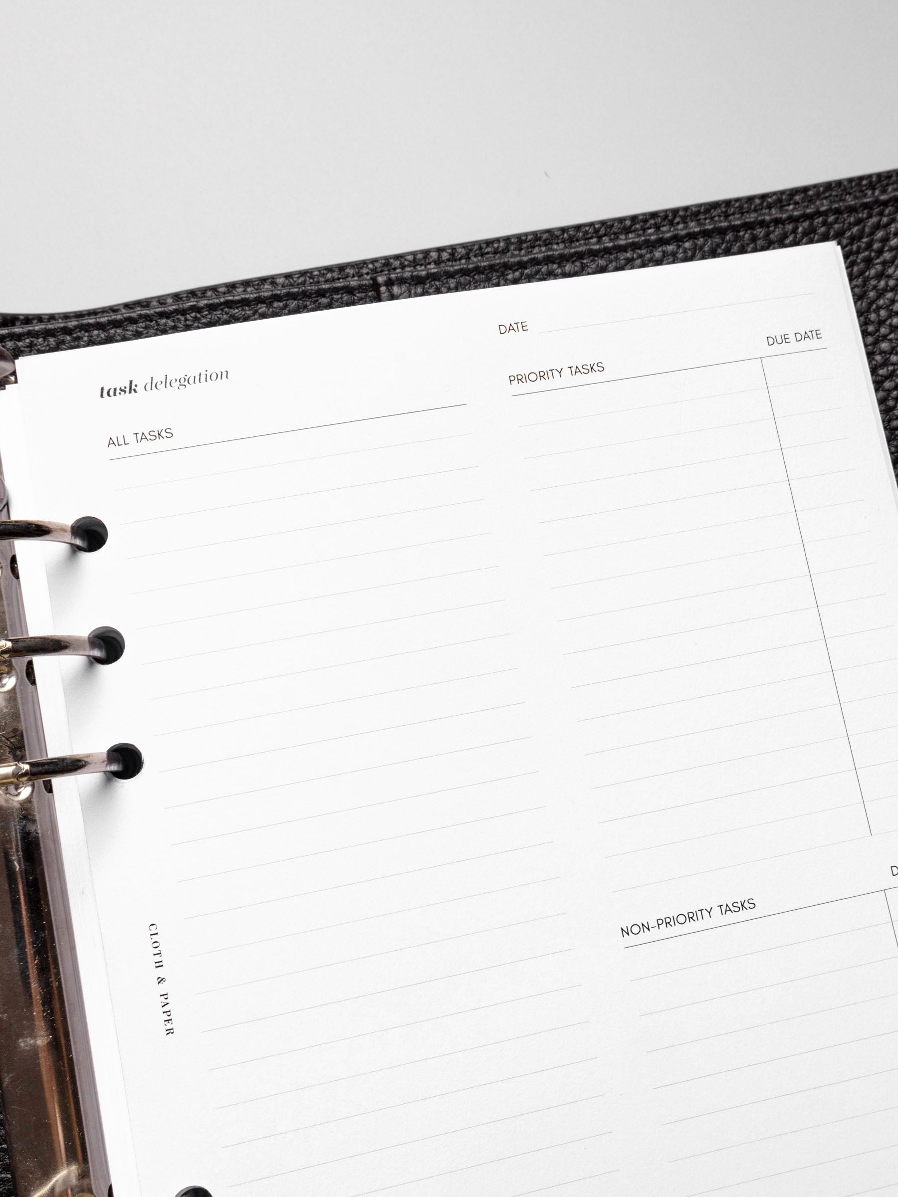 Insert in use inside a black leather planner.